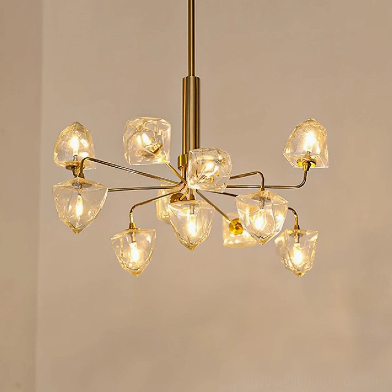 Luxury modern glass chandelier with clear shades and contemporary brass gold metal design