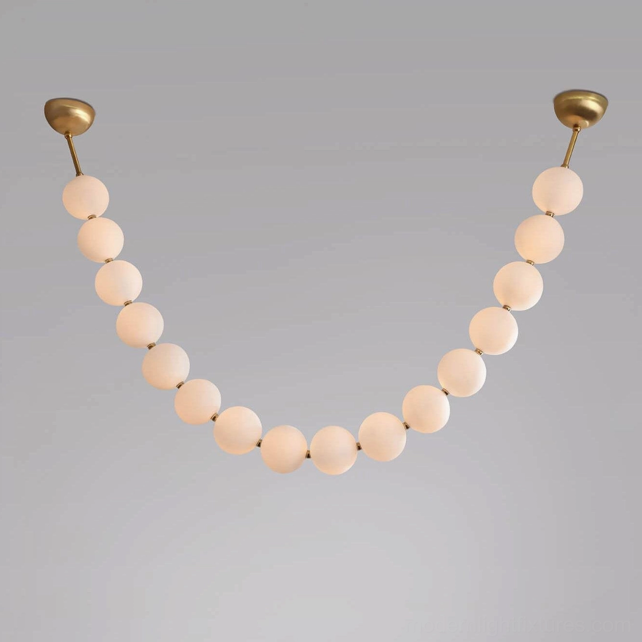 Luxury pearl chandelier with mixed acrylic finishes in contemporary architectural lighting design