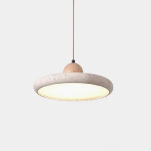 Lydia travertine pendant light with stone shade and wooden cap, studio front view showing speckled natural stone texture and integrated LED warm white glow