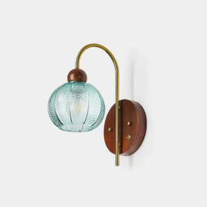 Lysora brass wall sconce with ribbed teal glass shade, front studio view, mid-century modern lighting fixture