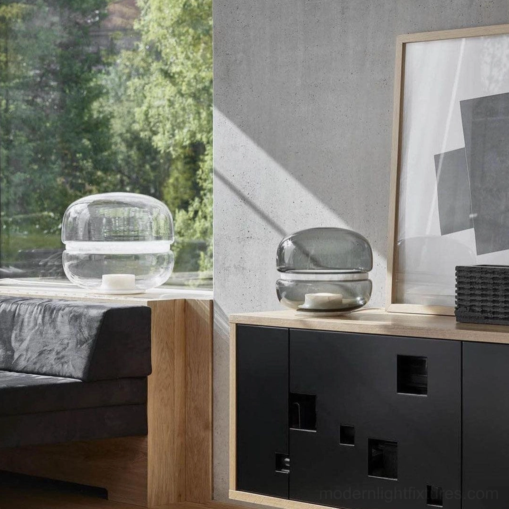 Macaron modern stone glass table lamp paired with contemporary furniture showing design coordination and styling
