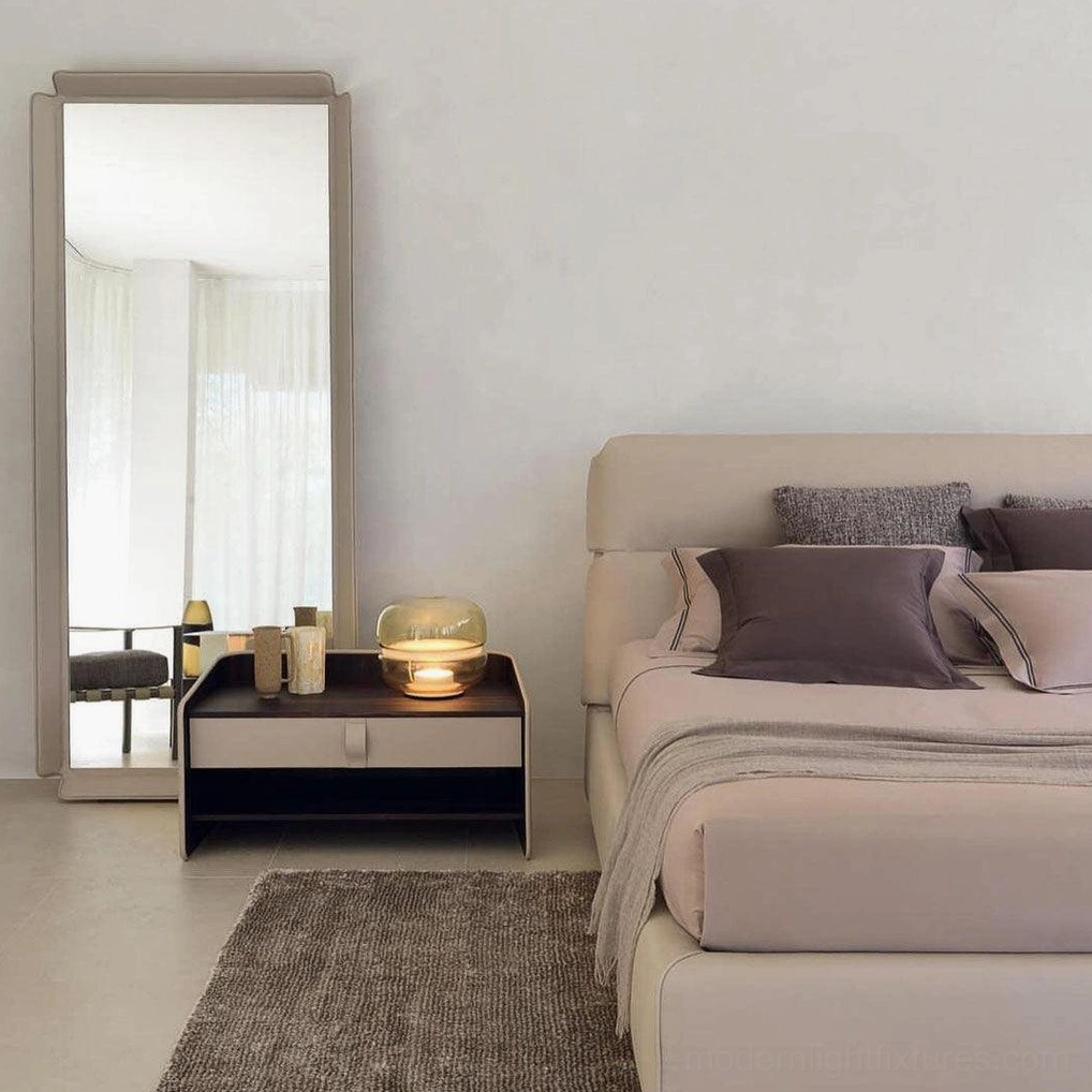 Macaron modern table lamp in contemporary master bedroom bedside setting creating warm ambient nighttime lighting