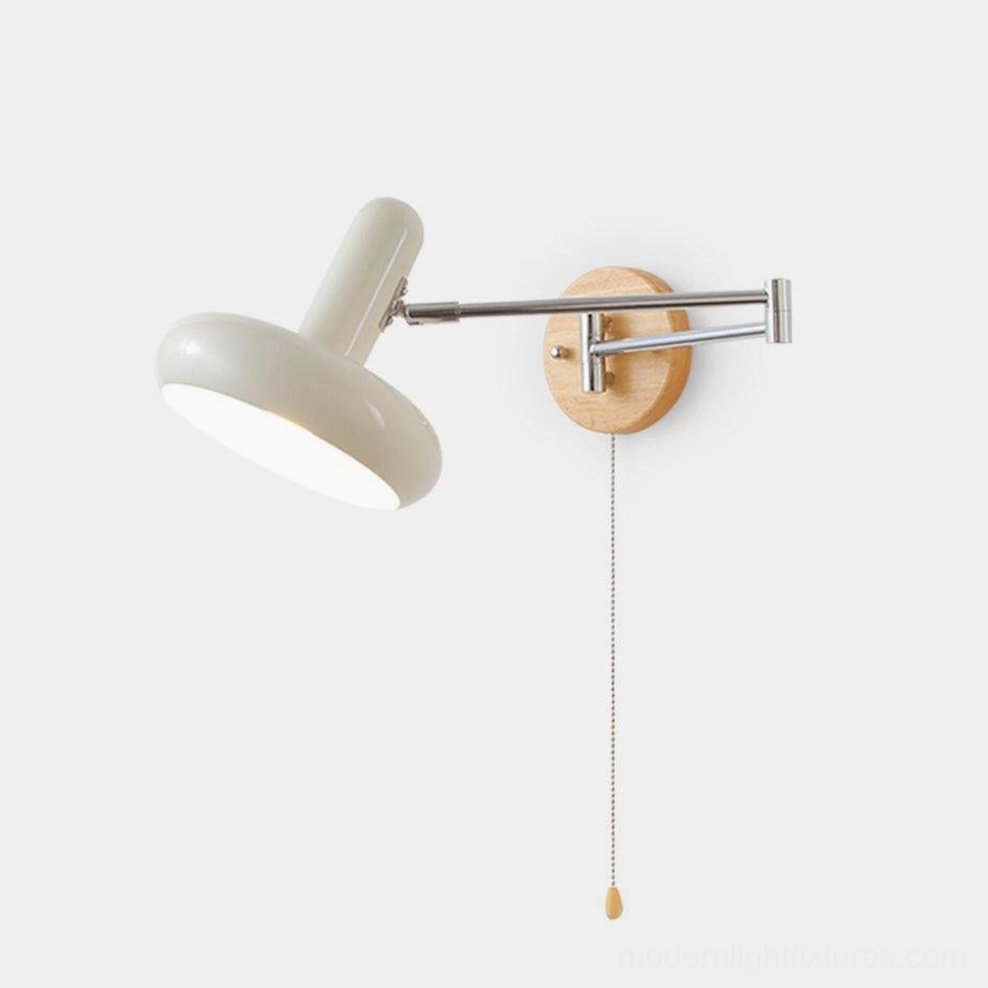Maddie adjustable swing arm wall sconce in white with chrome metal arm, shown in flat front studio view against neutral background