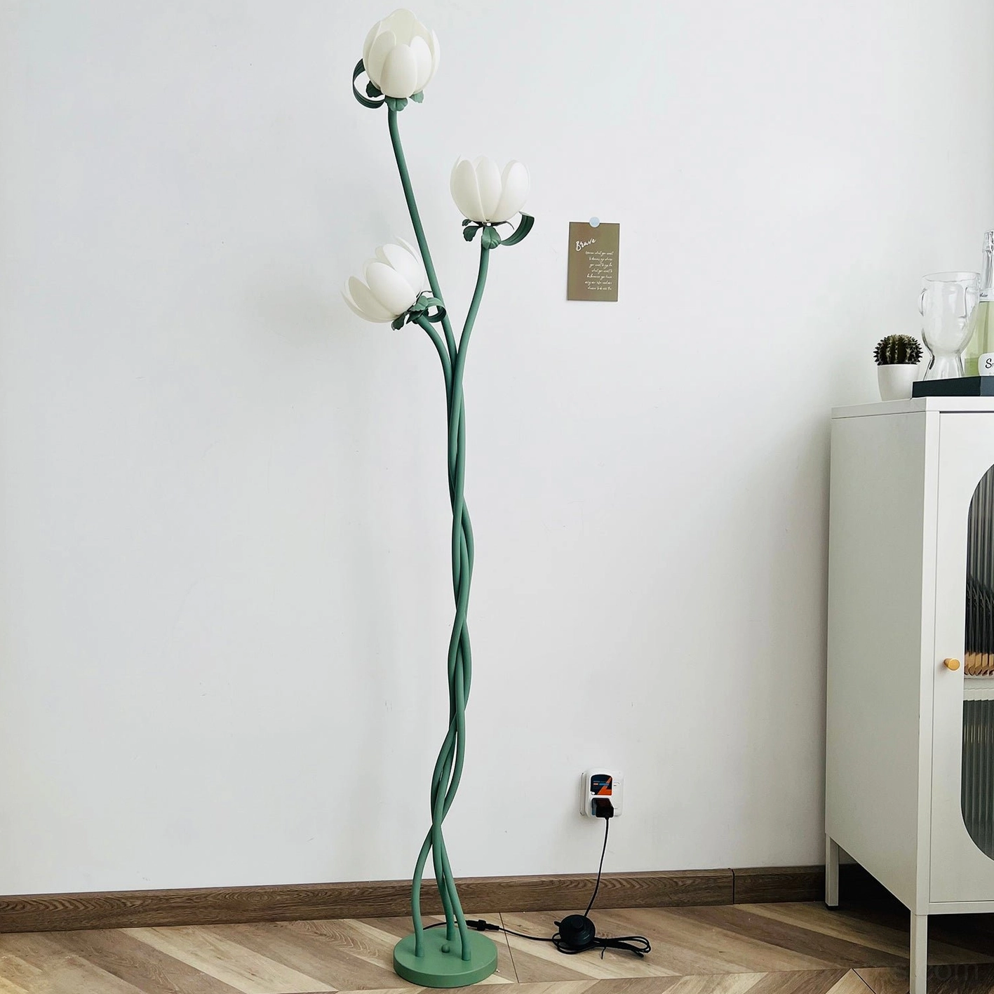 Complete magnolia bud floor lamp with three white acrylic blooms on green twisted metal stem ready for installation