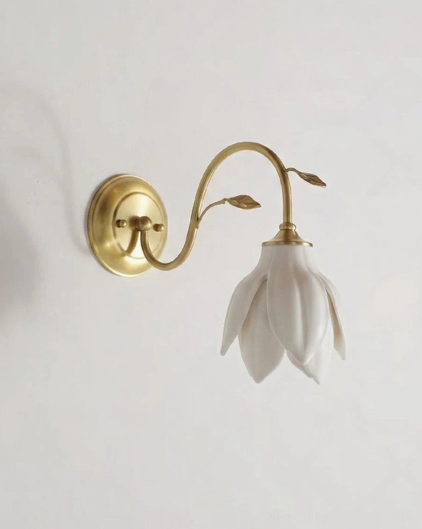Magnolia wall sconce side profile showing ceramic flower shade opening direction and brass mounting