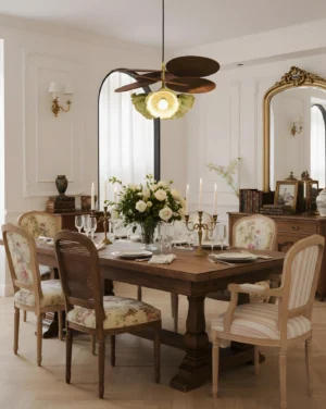 Magnolia floral pendant lamp illuminated above formal dining table in vintage dining room interior