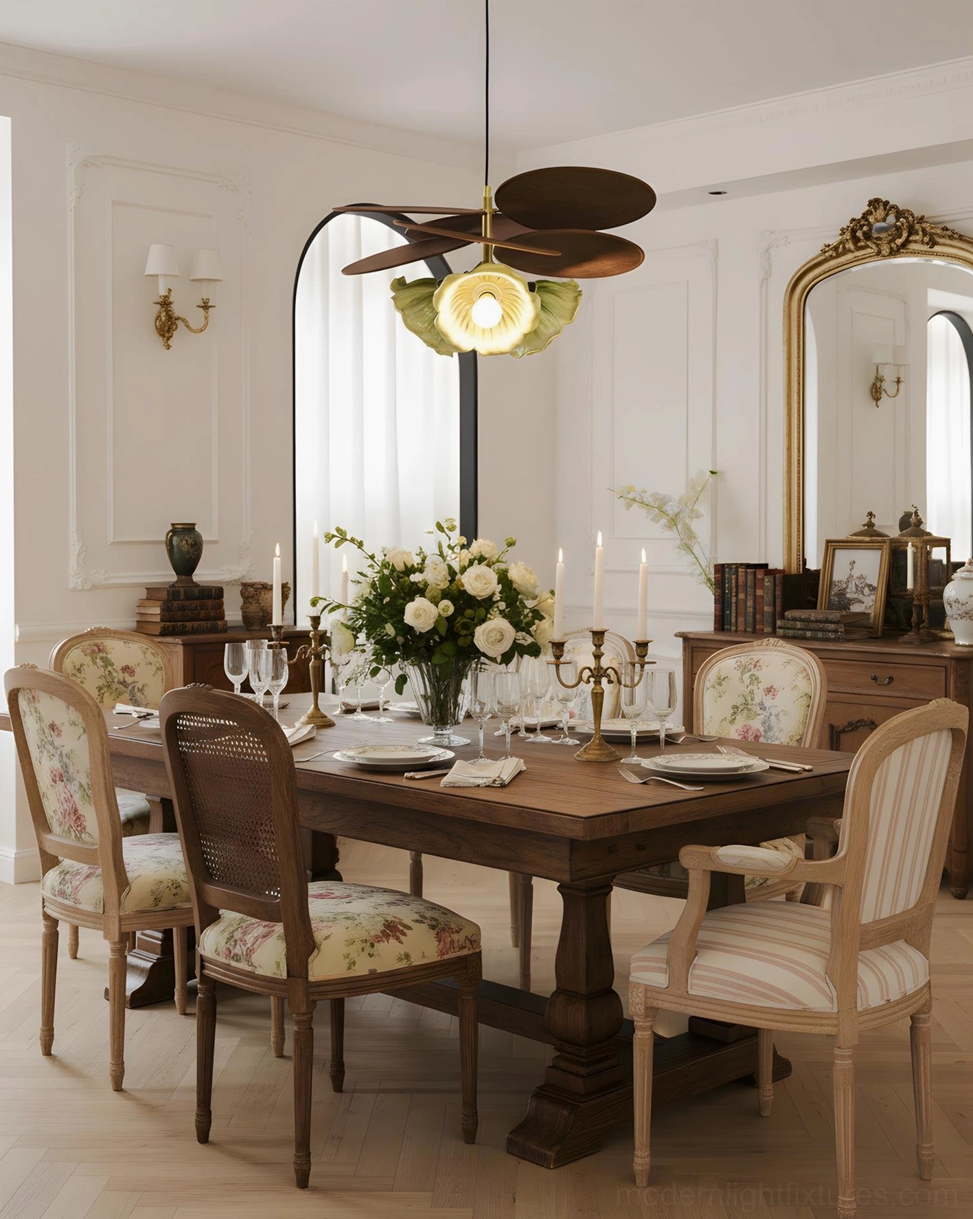 Magnolia floral pendant lamp illuminated above formal dining table in vintage dining room interior