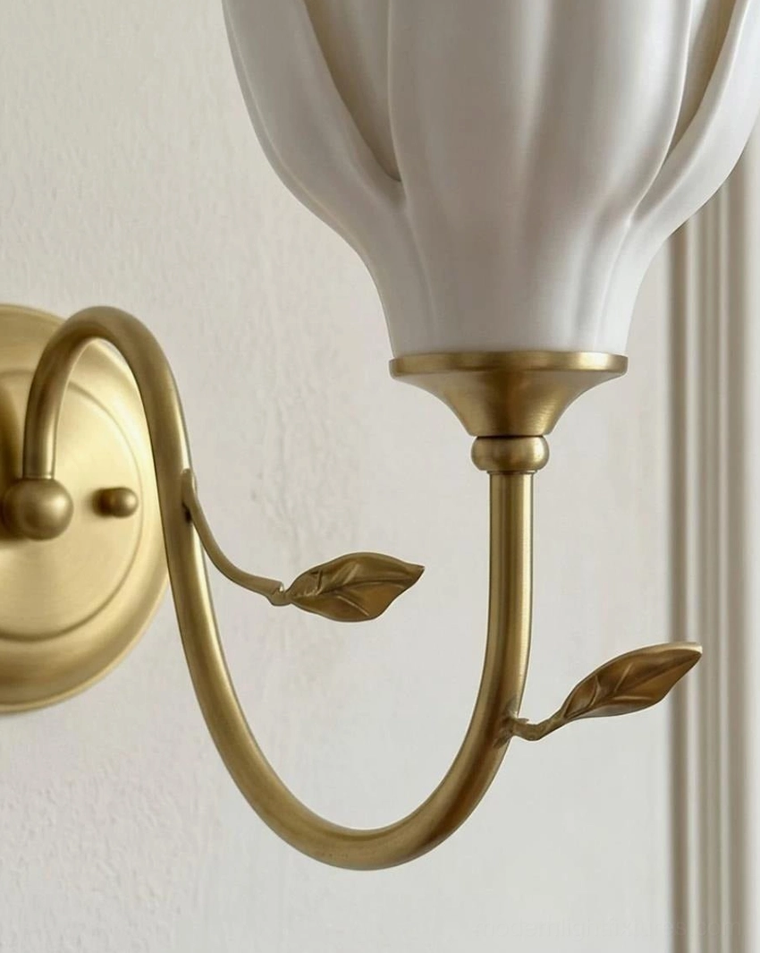 Magnolia ceramic wall sconce detailed view of hand-shaped layered petals and floral design elements