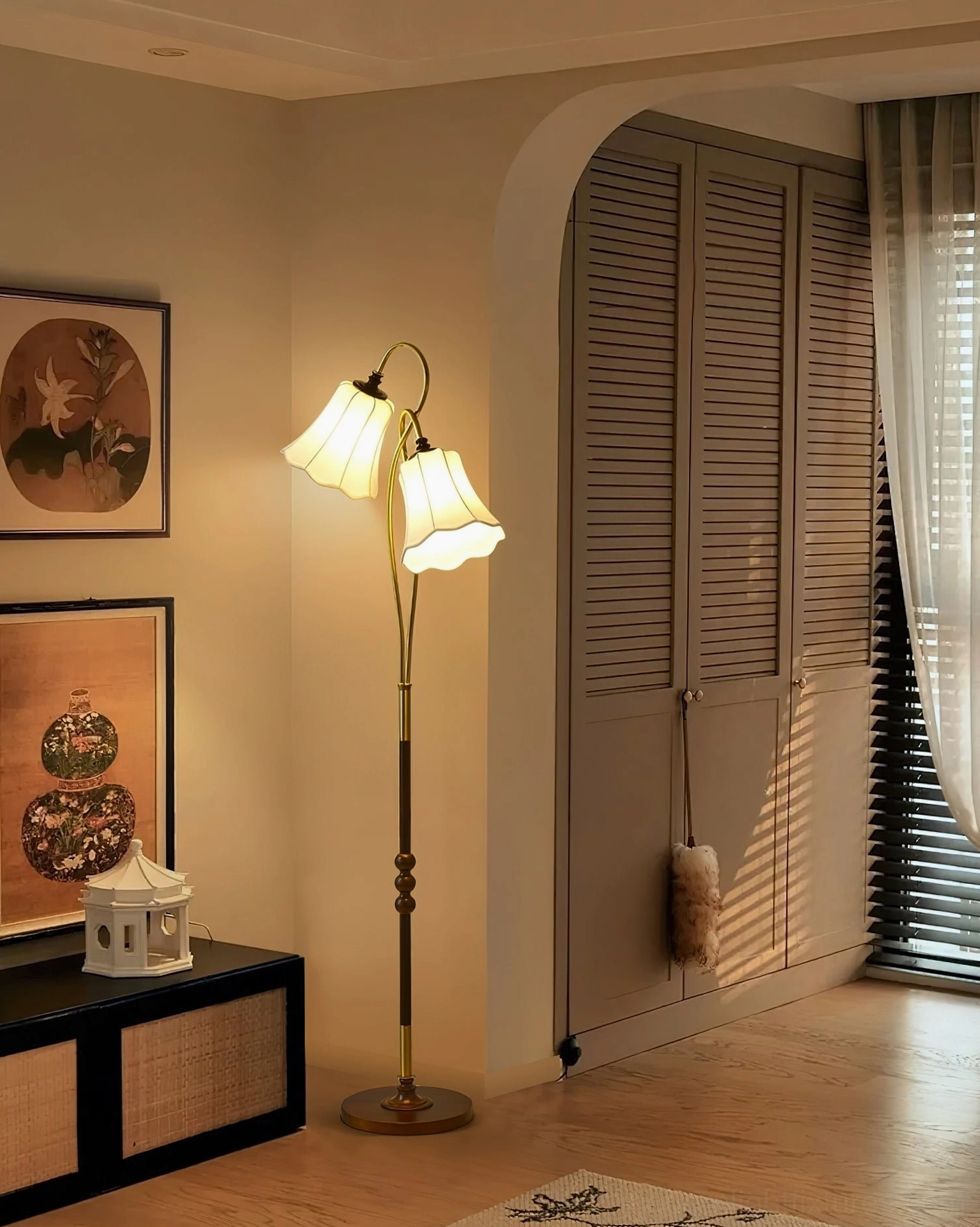 Magnolya retro floor lamp three-quarter front view entryway, decorative metal pole warm glowing light dual fabric shades