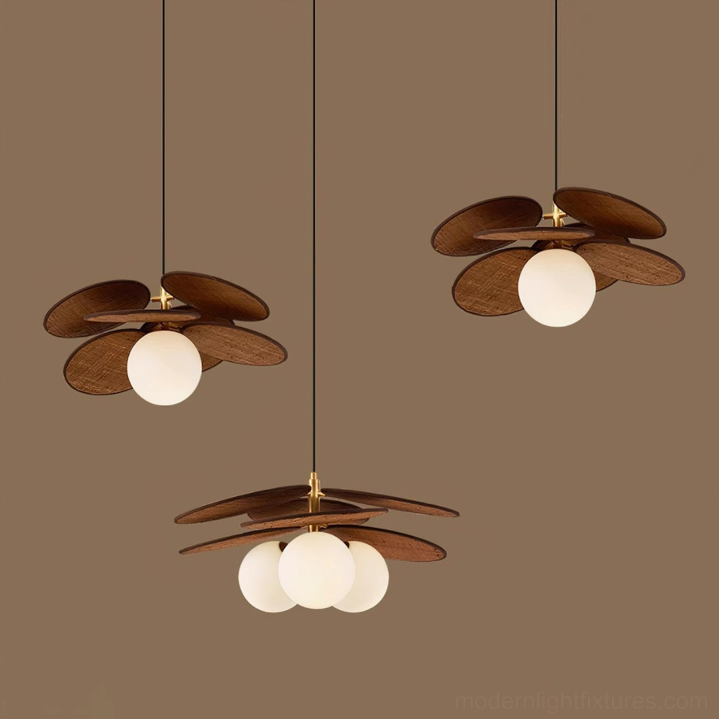 Mahalo pendant light collection showing three wooden globe variants in dark brown wood finish, product display comparison