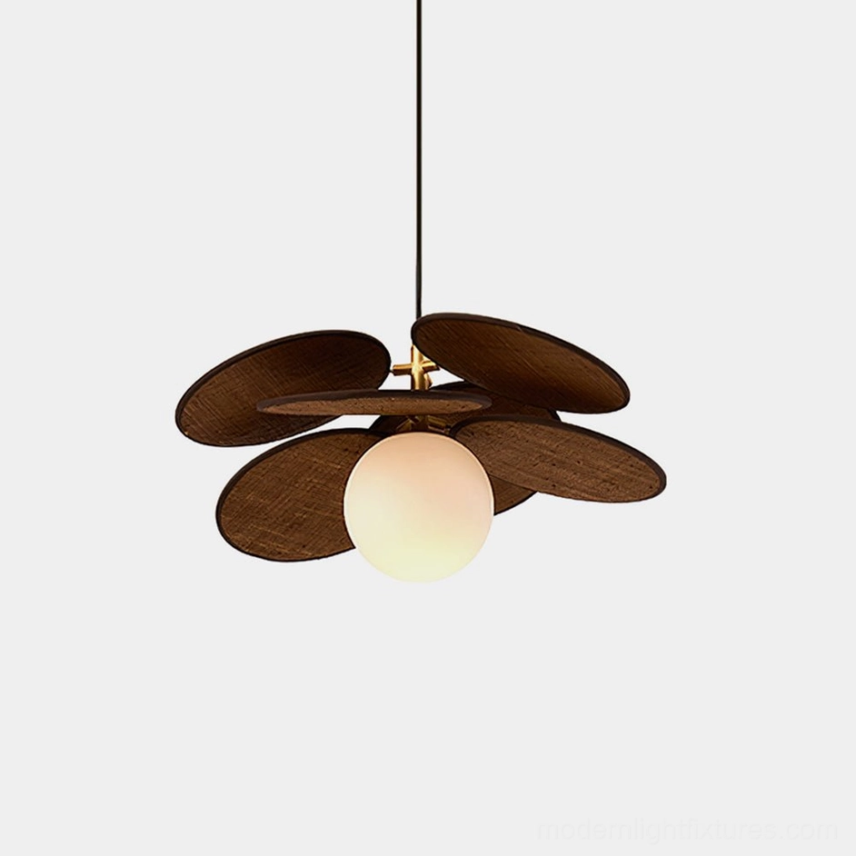 Mahalo wooden pendant light with walnut brown wood slats and frosted glass globe, close-up overhead view showing mid-century modern design