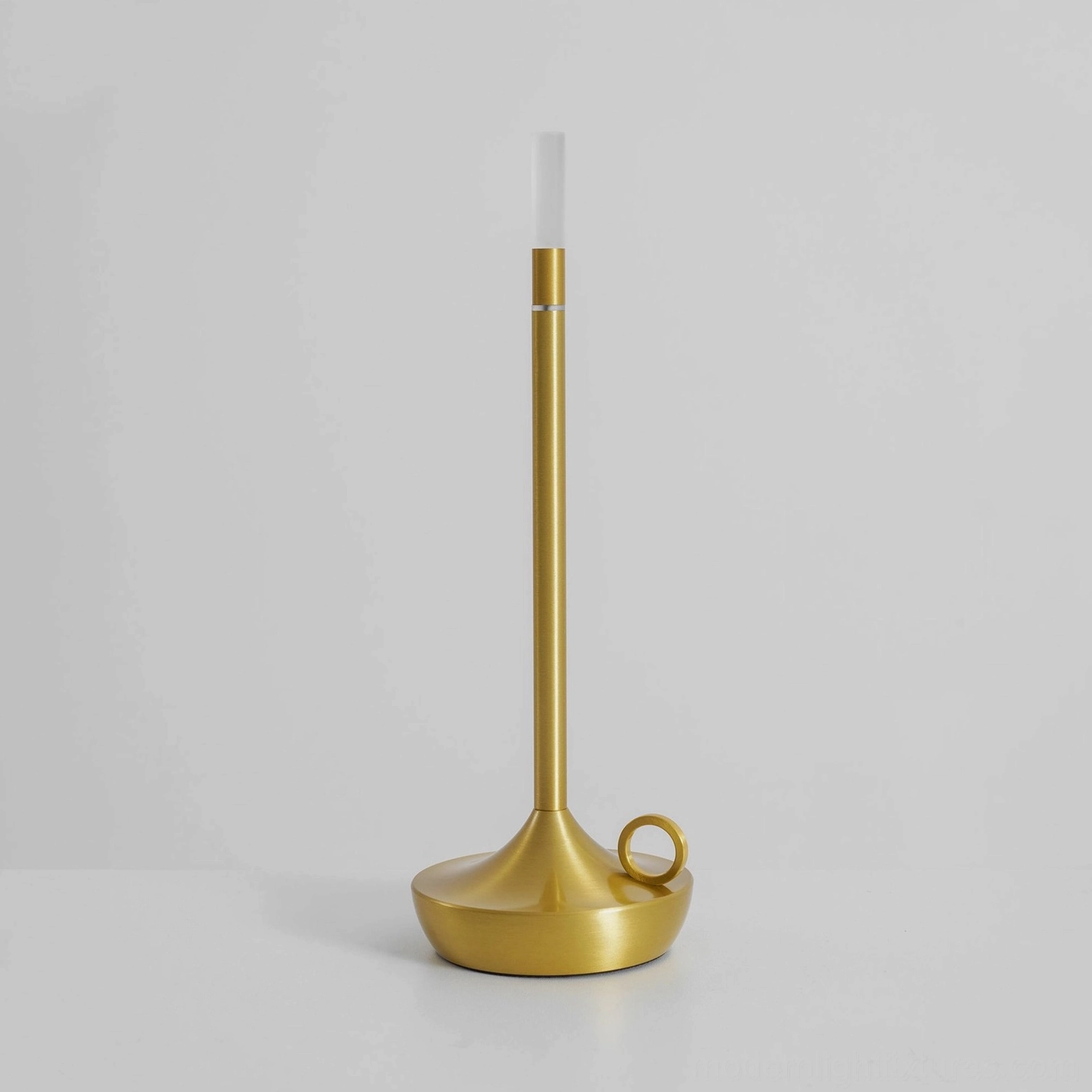 Minimalist LED candle table lamp providing consistent warm white illumination with reduced maintenance