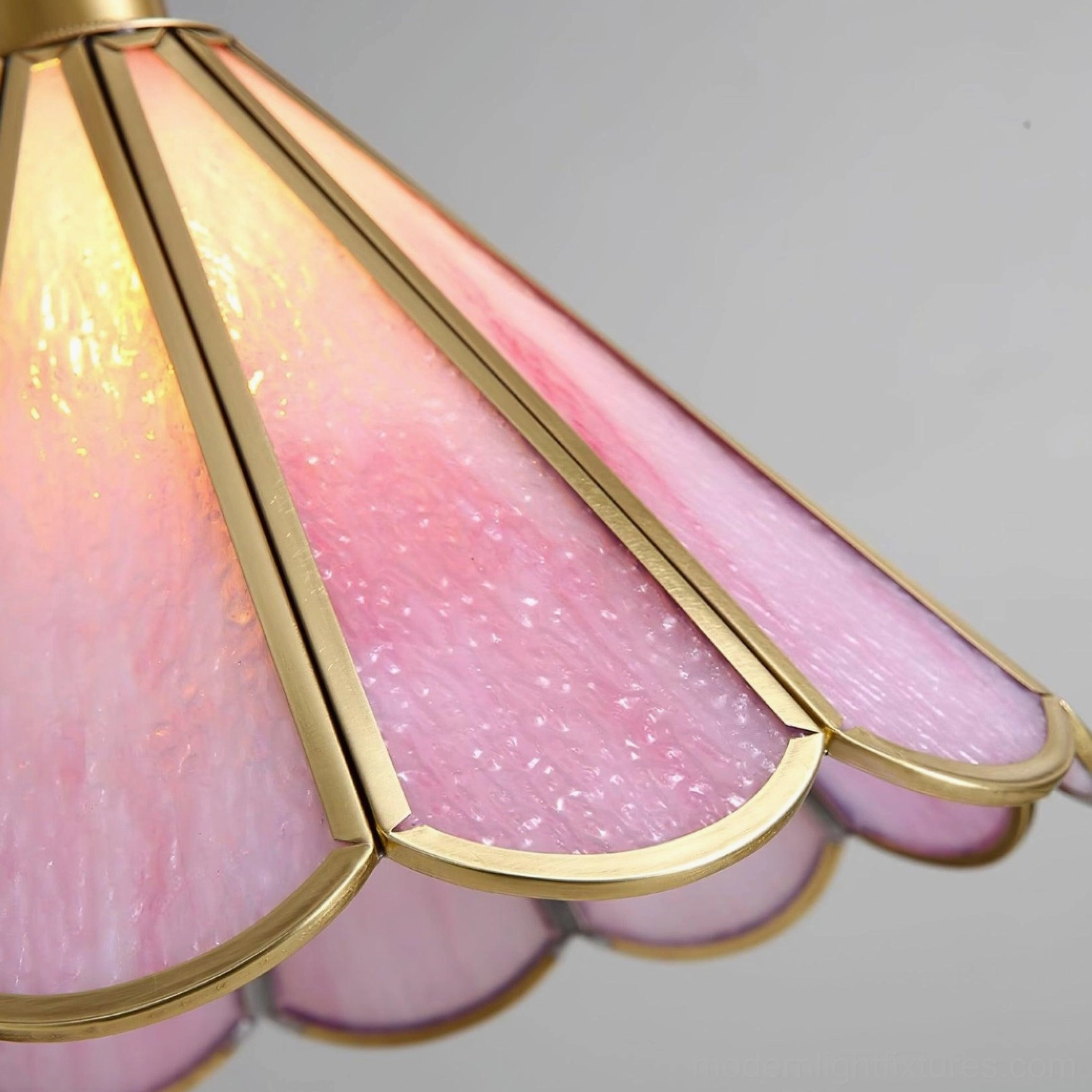 Maki gold brass glass pendant light in contemporary minimalist interior setting