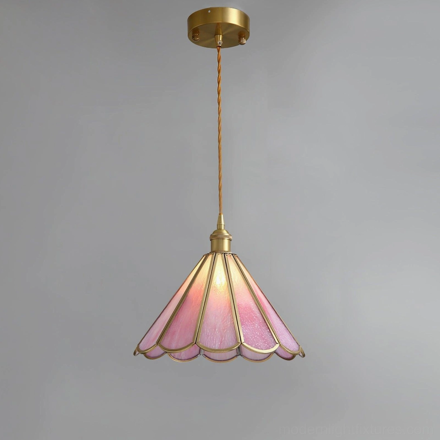 Maki Model A pink glass pendant light, scalloped shade with brass hardware detail