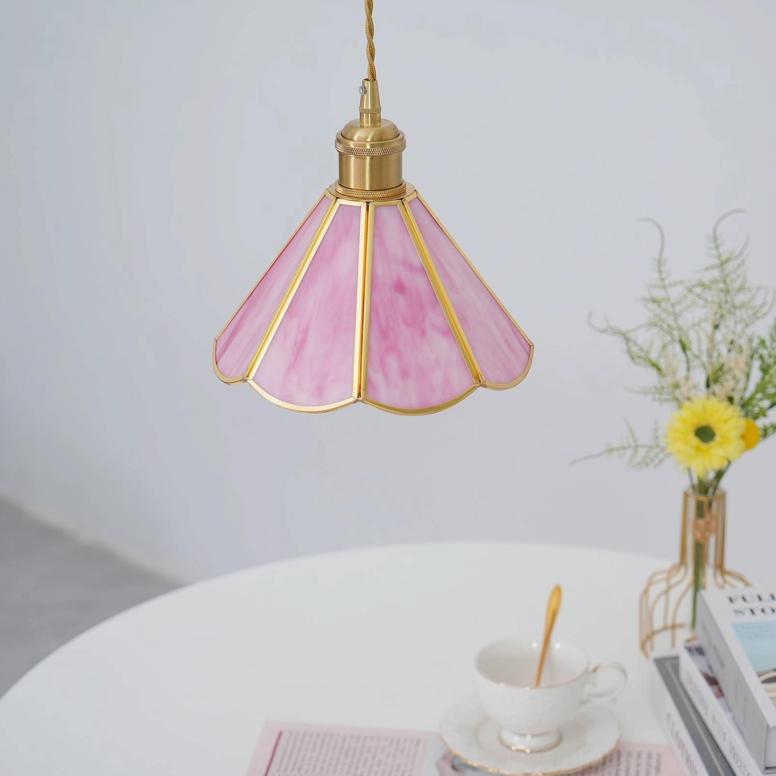 Maki glass pendant light brass trim and hardware detail, close-up view