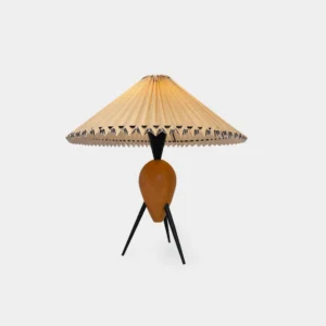 Makie mid-century modern table lamp with pleated fabric shade and wooden burl base, front studio view