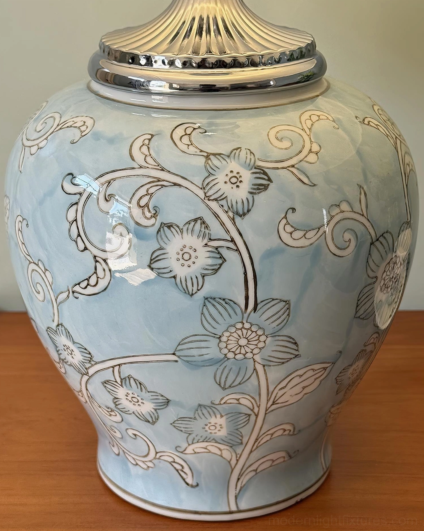 Artistic presentation of mandarin ceramic table lamp showcasing hand-glazed artisanal quality, sculptural silhouette, and traditional Asian pottery heritage in modern interior context