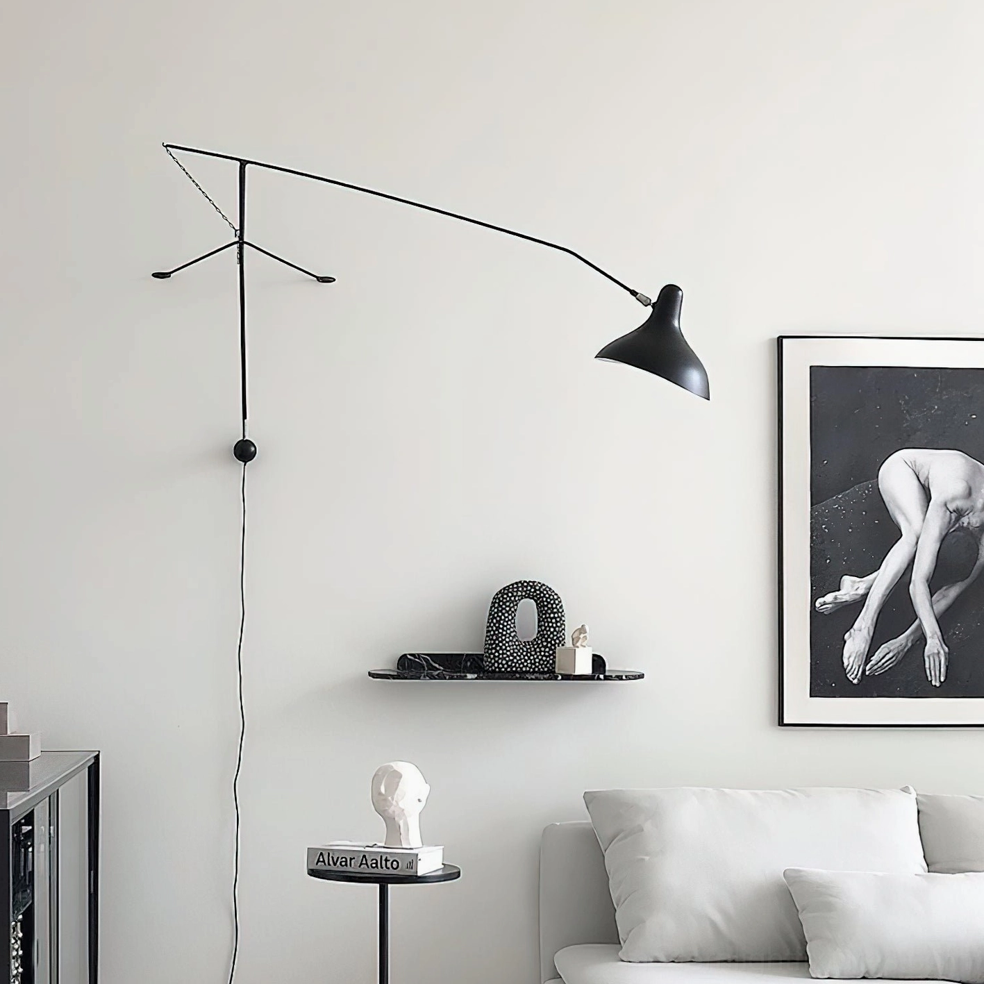 Black articulating wall sconce in Nordic living room with wall art decor