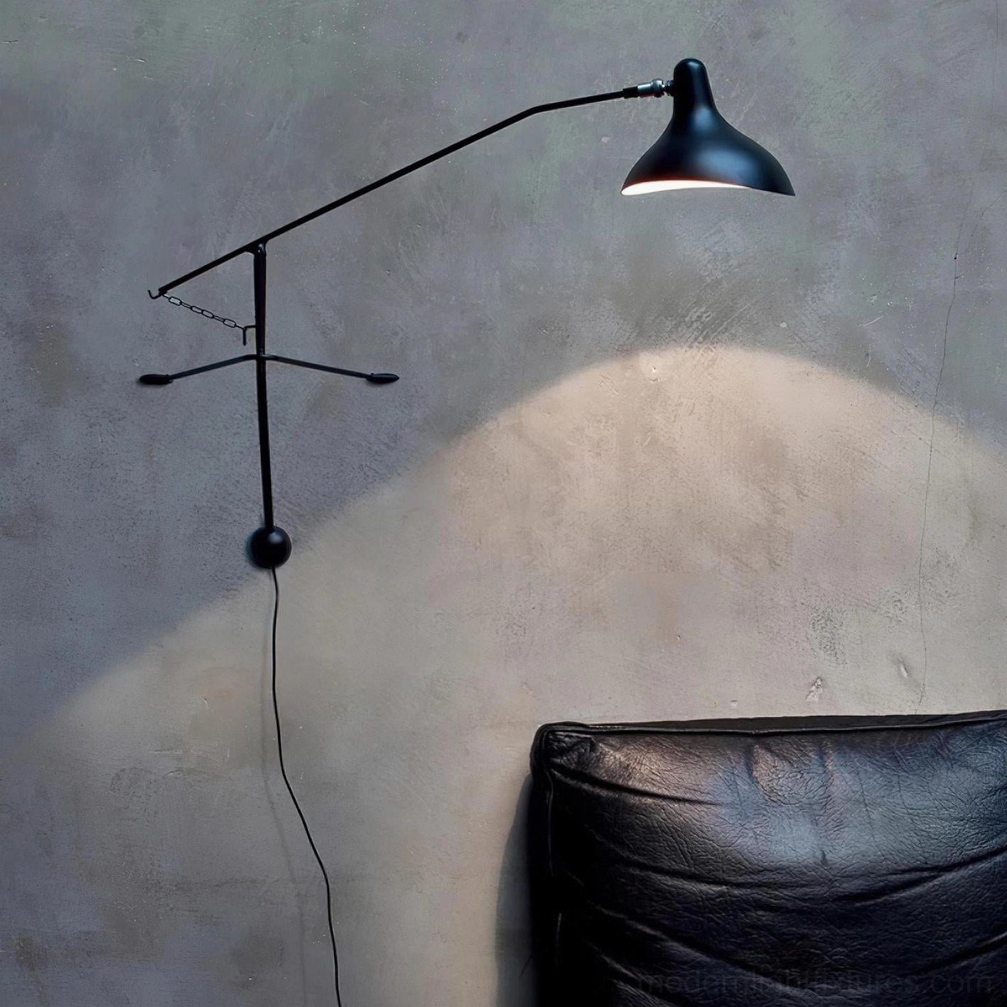 Matte black wall sconce installation mounted on residential interior wall