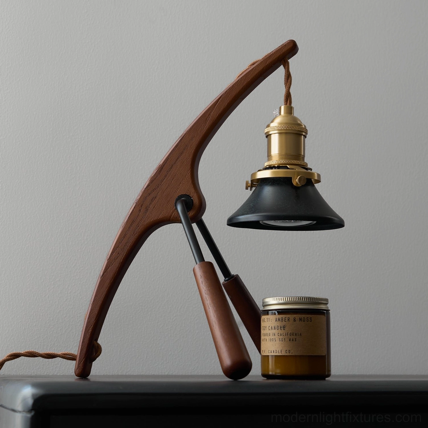 Praying mantis candle warmer lamp, contemporary interior design, intentional living aesthetic