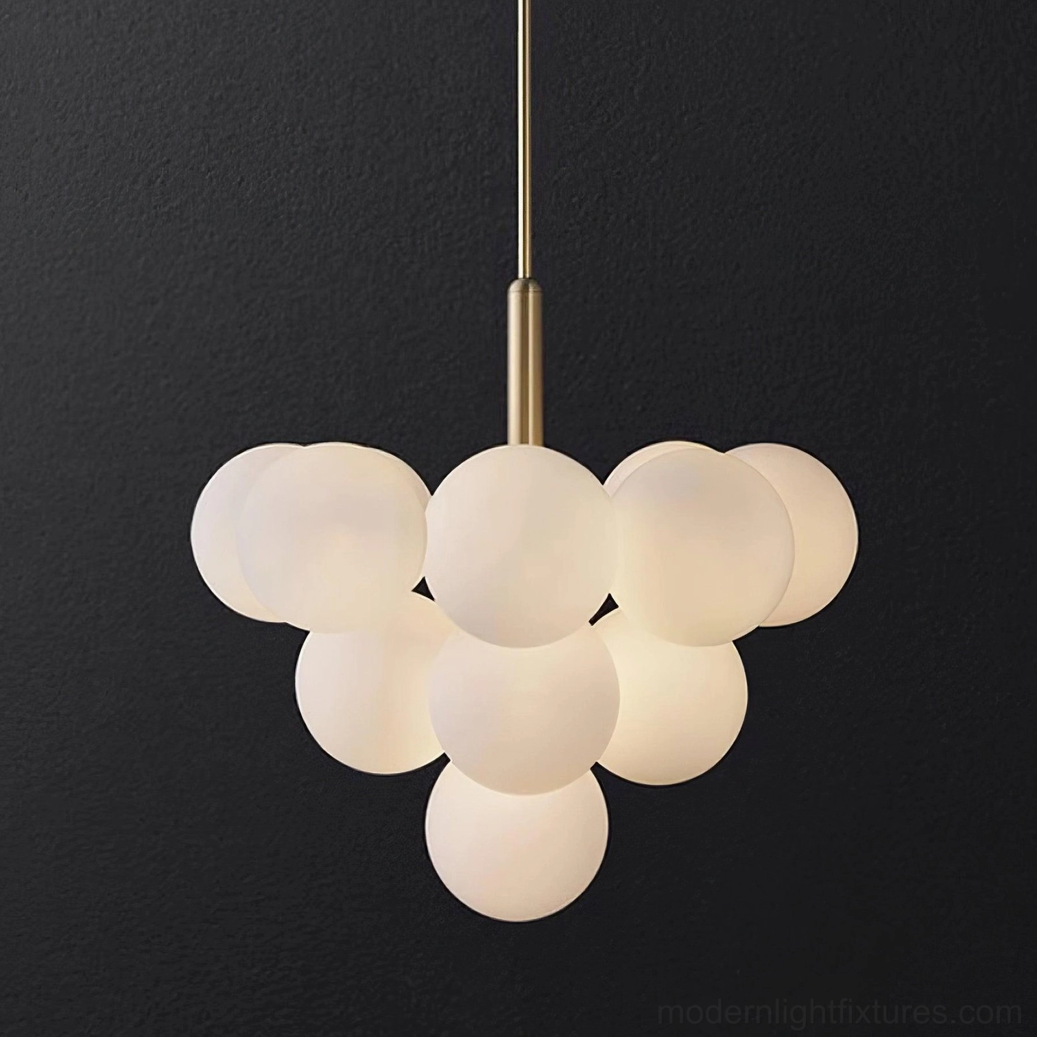 Large 13-head glass bubble cluster chandelier frosted globes with brass hardware on black background