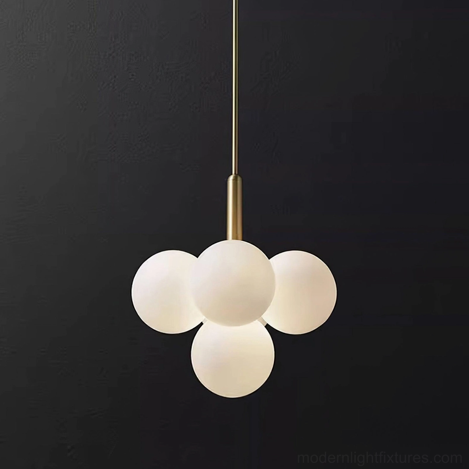 Compact 5-head glass globe chandelier close-up on black background modern pendant light