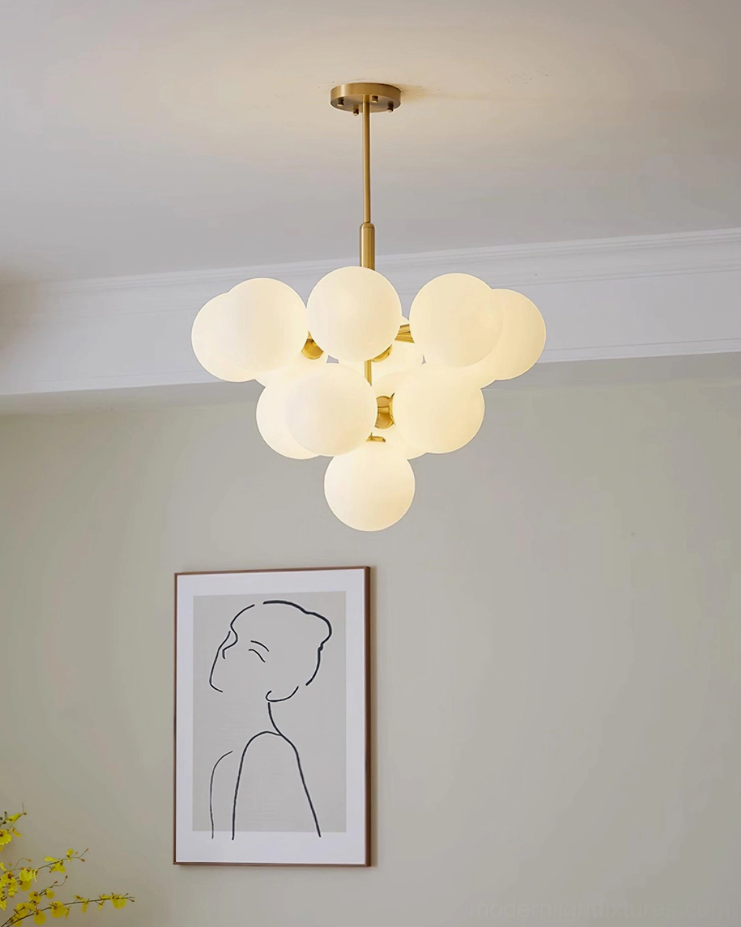 Marais Pointe glass globe chandelier architectural detail view showing brass framework
