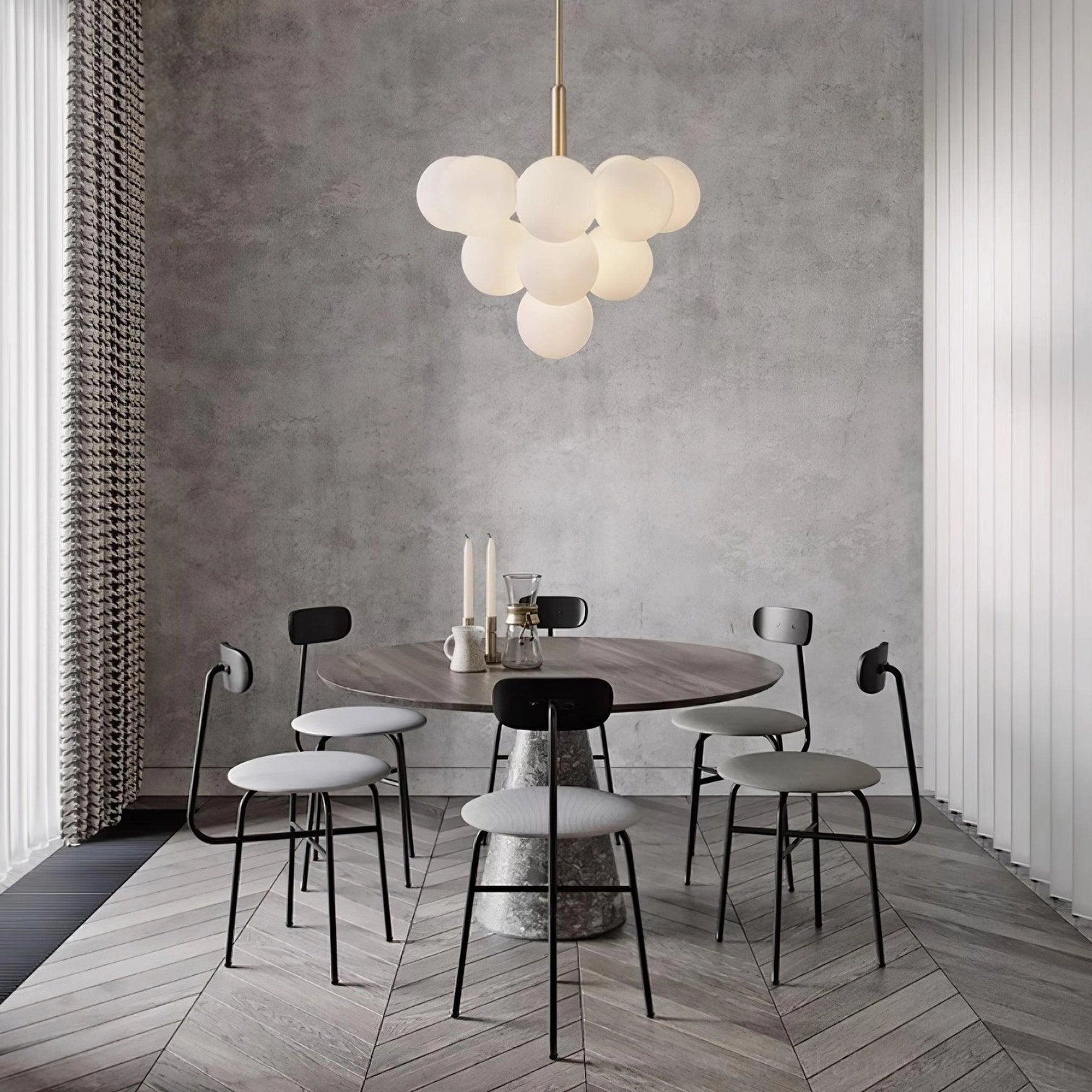 Glass bubble cluster chandelier in modern dining area with round table industrial minimalist style