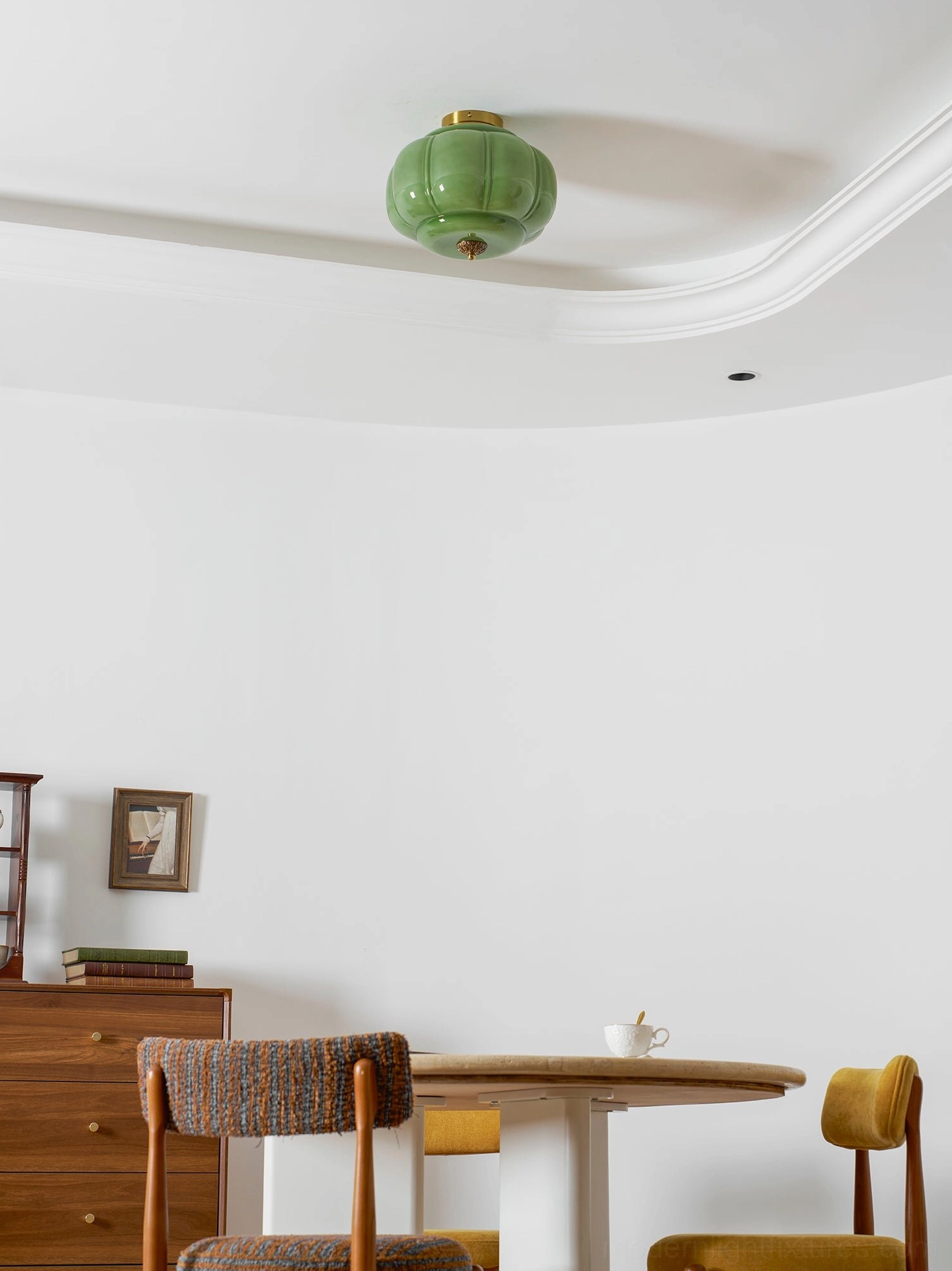 Maravine handcrafted glass ceiling lamp detail showing translucent properties and organic form, brass fitting close-up
