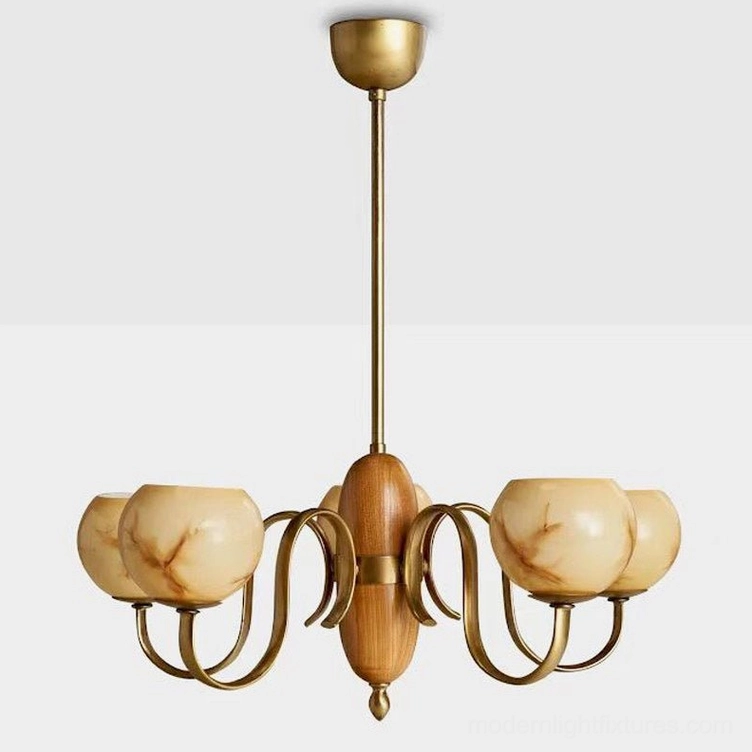 Close-up detailed view of 5-light marble glass chandelier showing curved brass arms and wooden decorative center