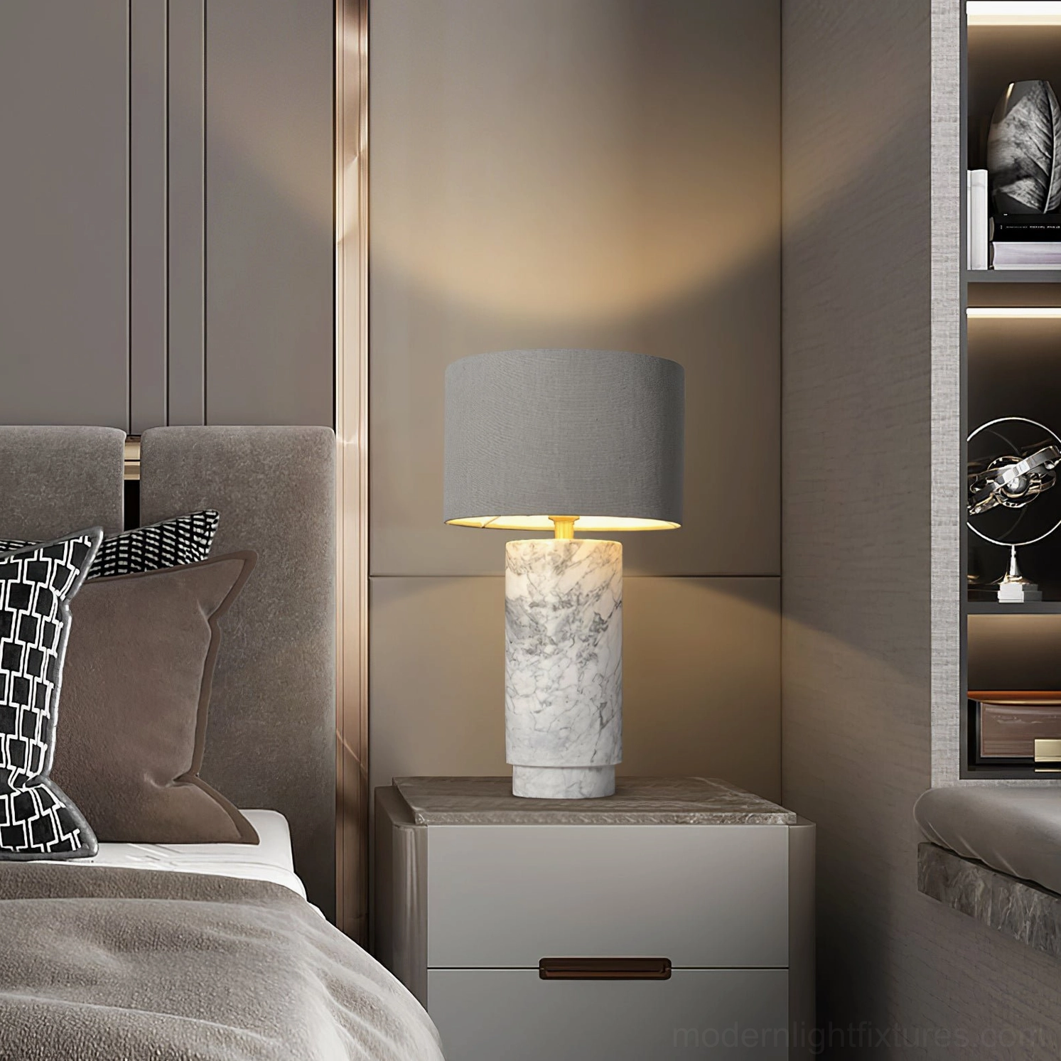 Modern marble table lamp with grey fabric shade positioned on bedroom nightstand in contemporary neutral bedroom setting