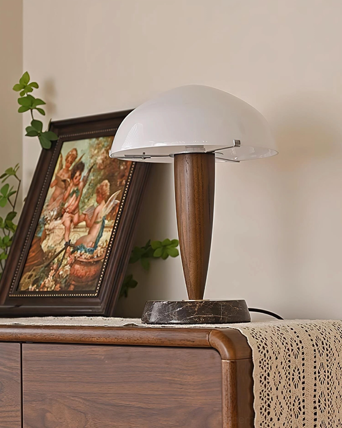Contemporary table lamp close-up detail showing marble base craftsmanship and tapered wooden stem construction quality