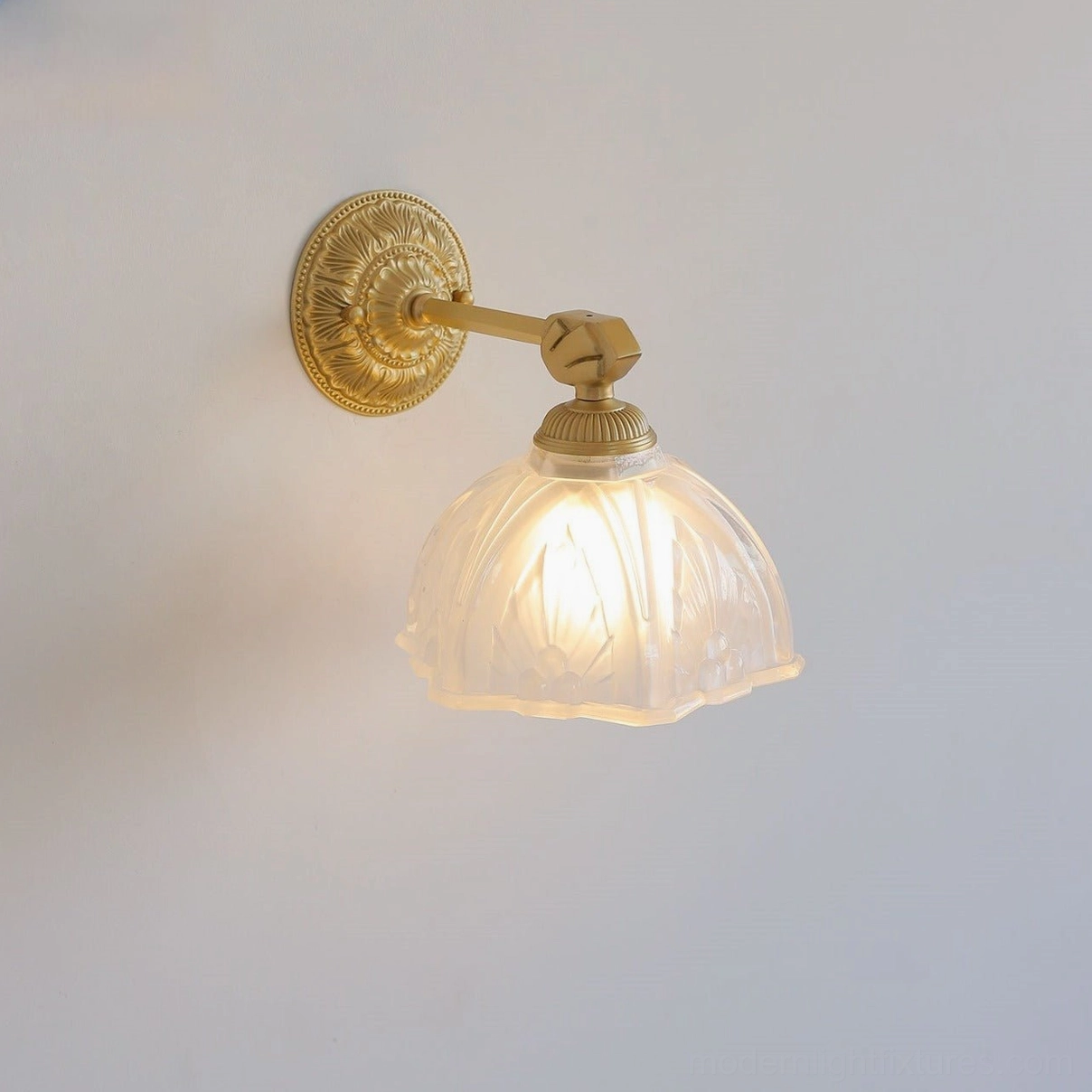 Marceau wall sconce side oblique angle showing frosted fluted glass shade and brass fixture construction