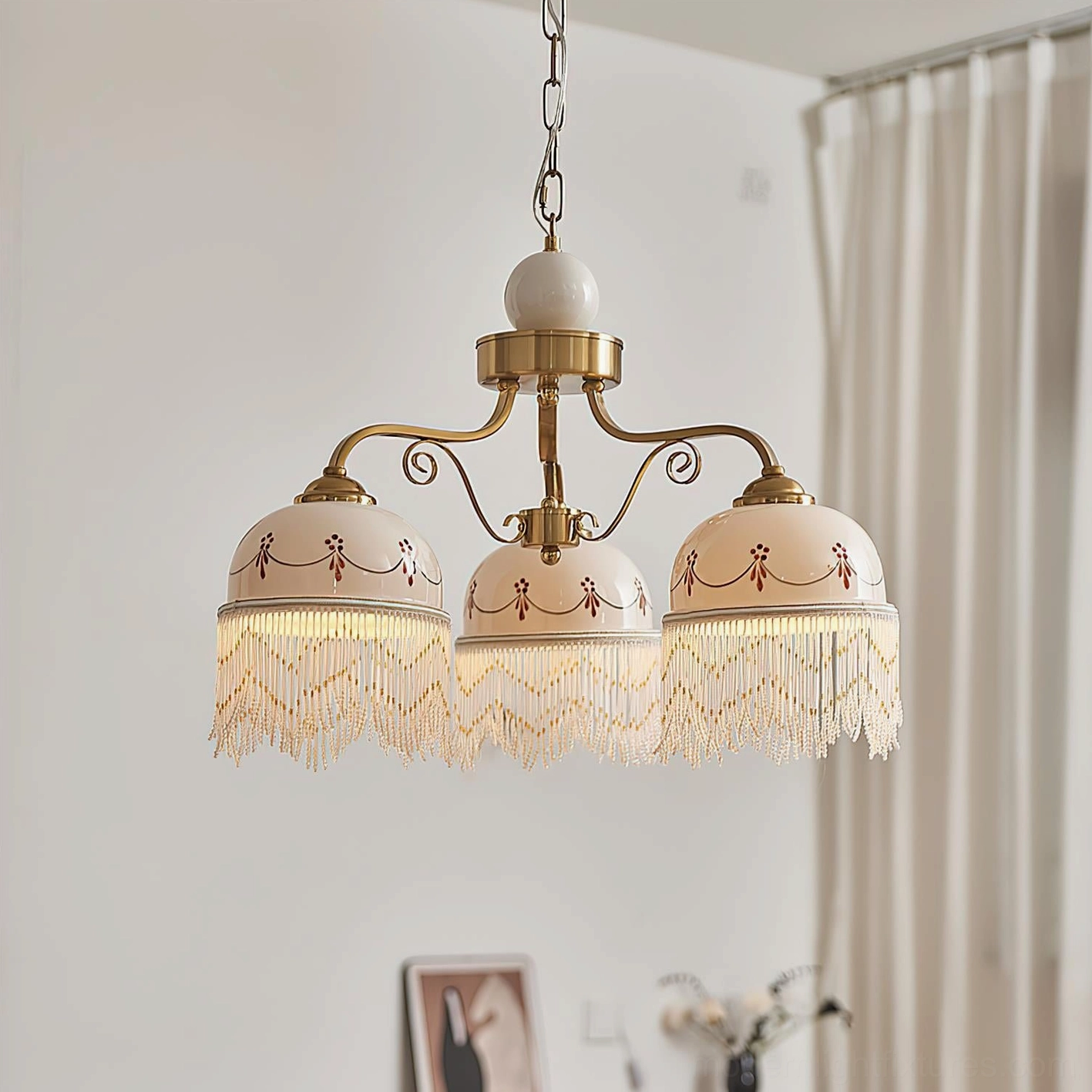 3-head Marcelline vintage chandelier with brushed brass frame and hand-painted embroidered glass shades, window curtain residential setting