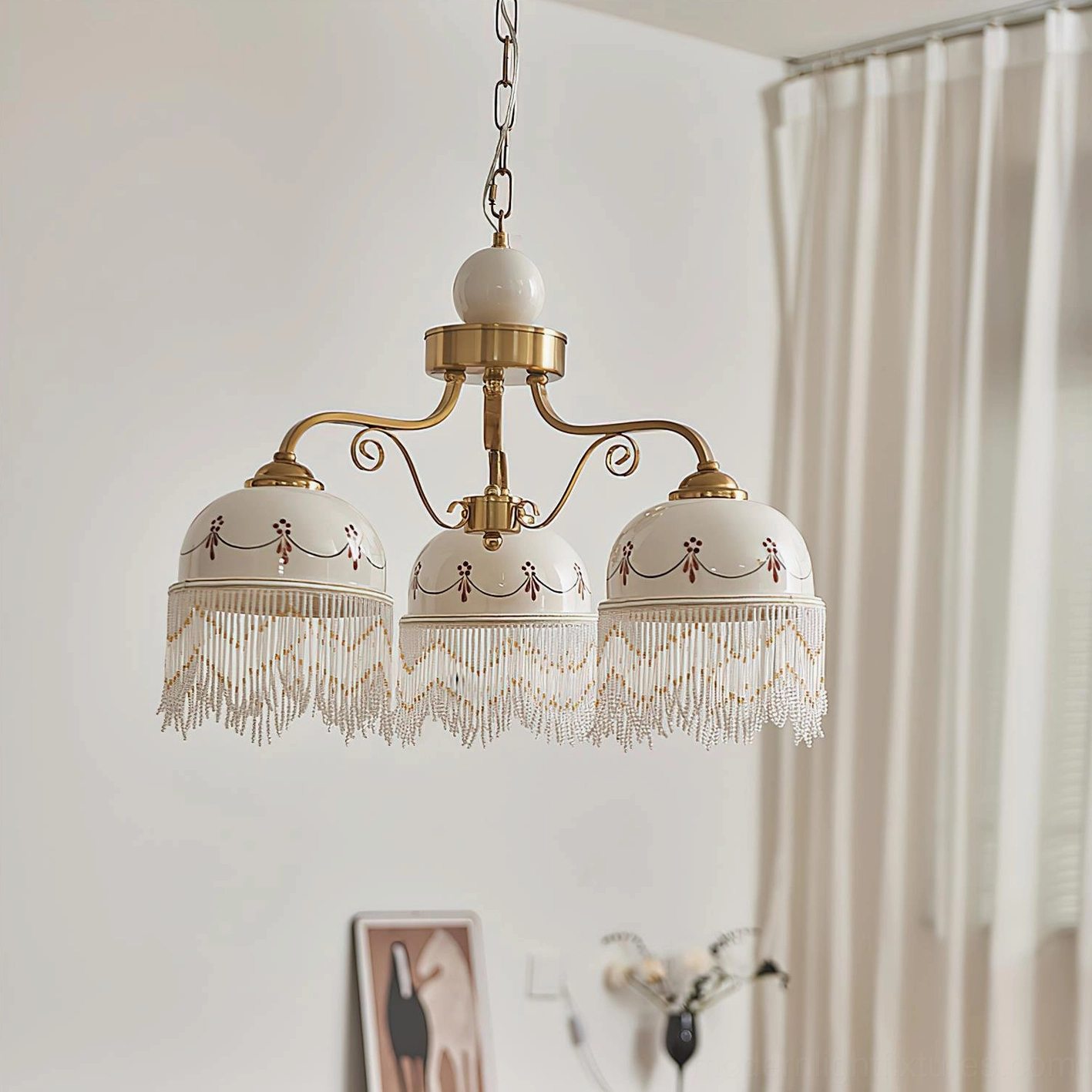 3-head Marcelline vintage chandelier, isolated product photograph showing brass frame, off-white embroidered shades, and tassel trim