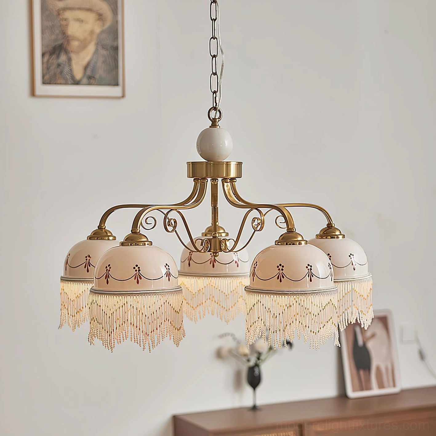 5-head Marcelline vintage chandelier in retro living room setting, brass gold frame with embroidered off-white shades and cascading beaded trim