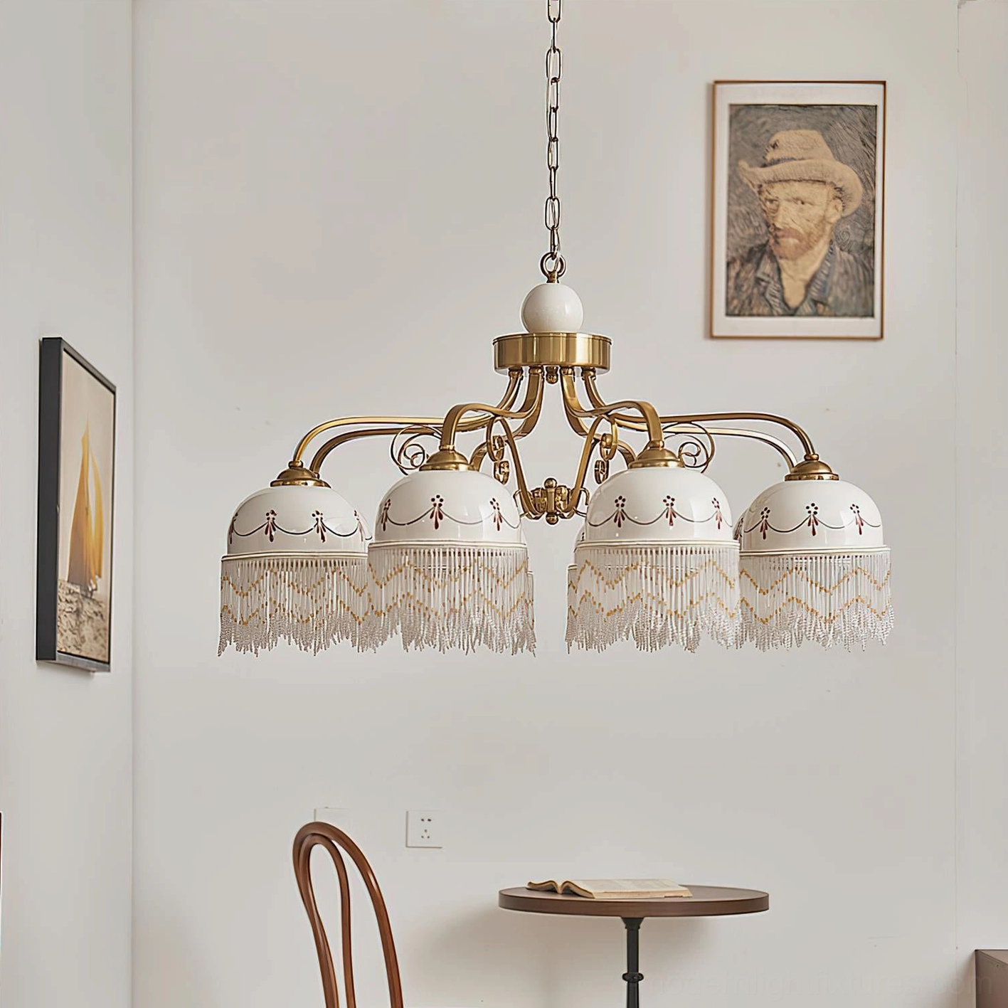 8-head Marcelline chandelier in retro dining area with wall art, showing brass frame, embroidered glass domes, and beaded fringe trim detail