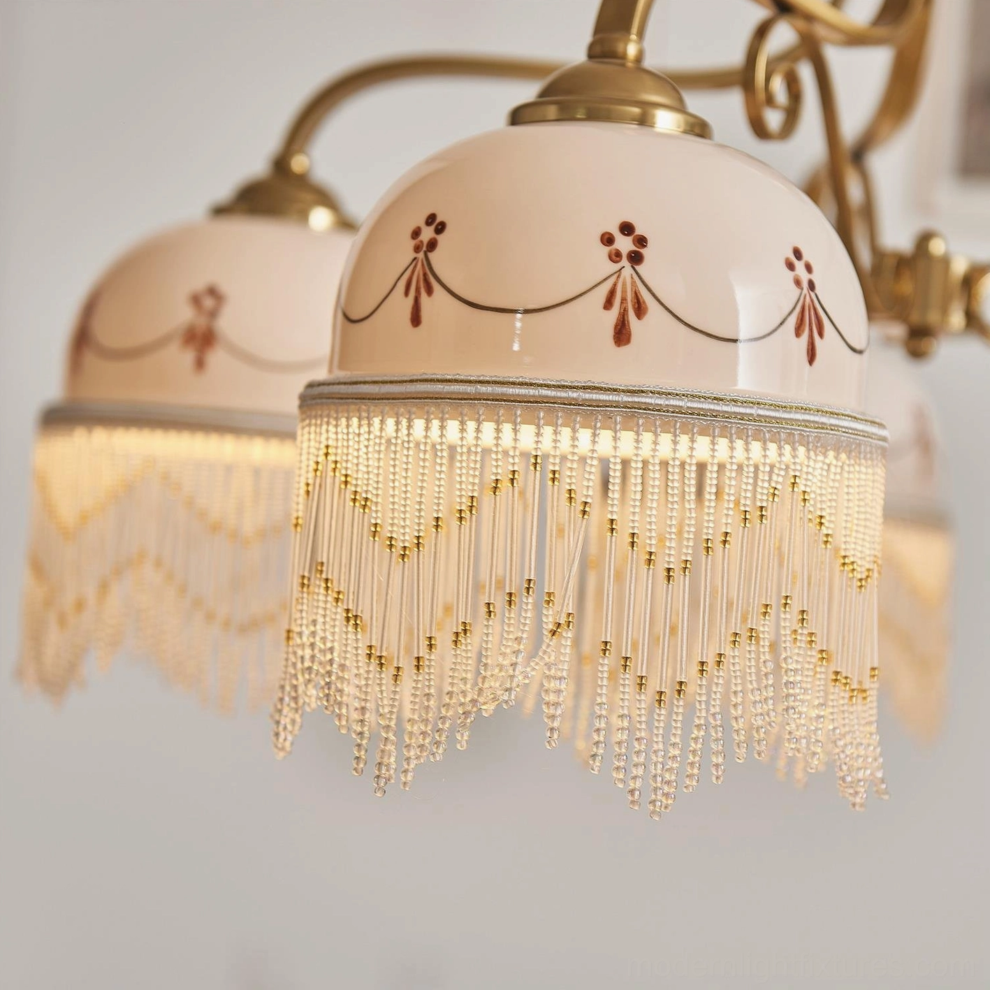 8-head Marcelline beaded fringe chandelier mounted in retro room setting, showing full spread and cascading tassel decoration effect