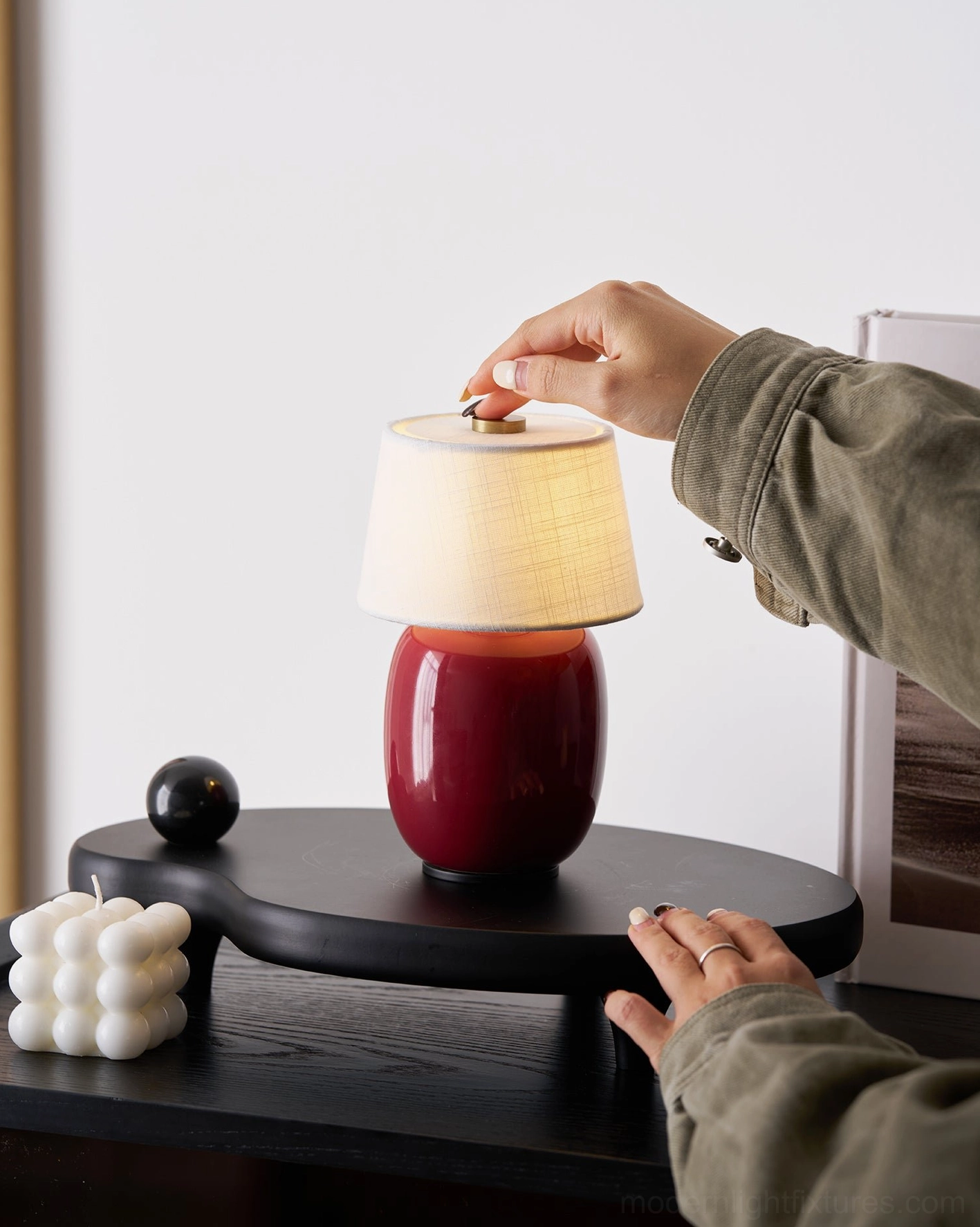 Minimalist ceramic table lamp shade detail – natural fabric diffuser with soft warm glow illumination