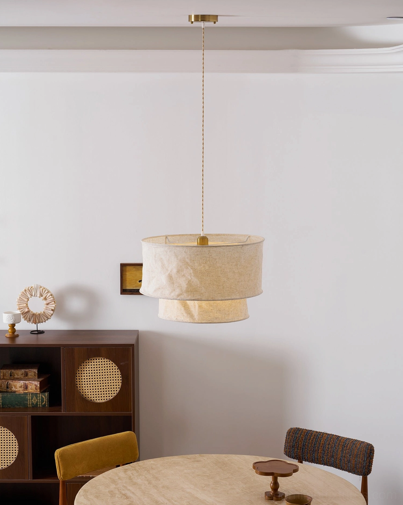 Double-layer crumpled fabric pendant light creating layered light diffusion in residential space