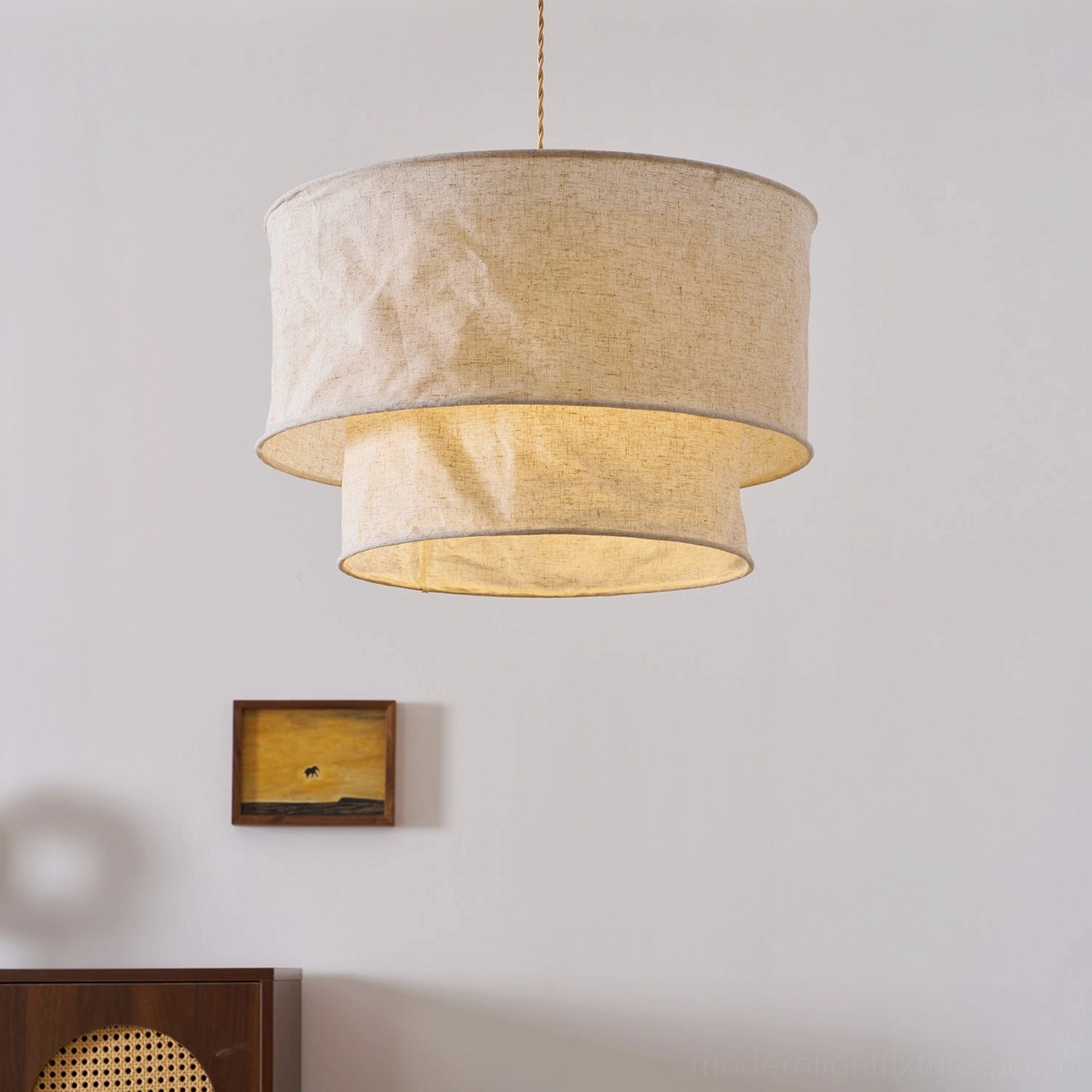 Two-tier fabric pendant light with soft diffused glow in neutral minimalist residential decor