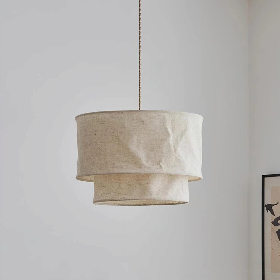 Mariela textured linen pendant light fixture front display showing drum shape and fabric layers
