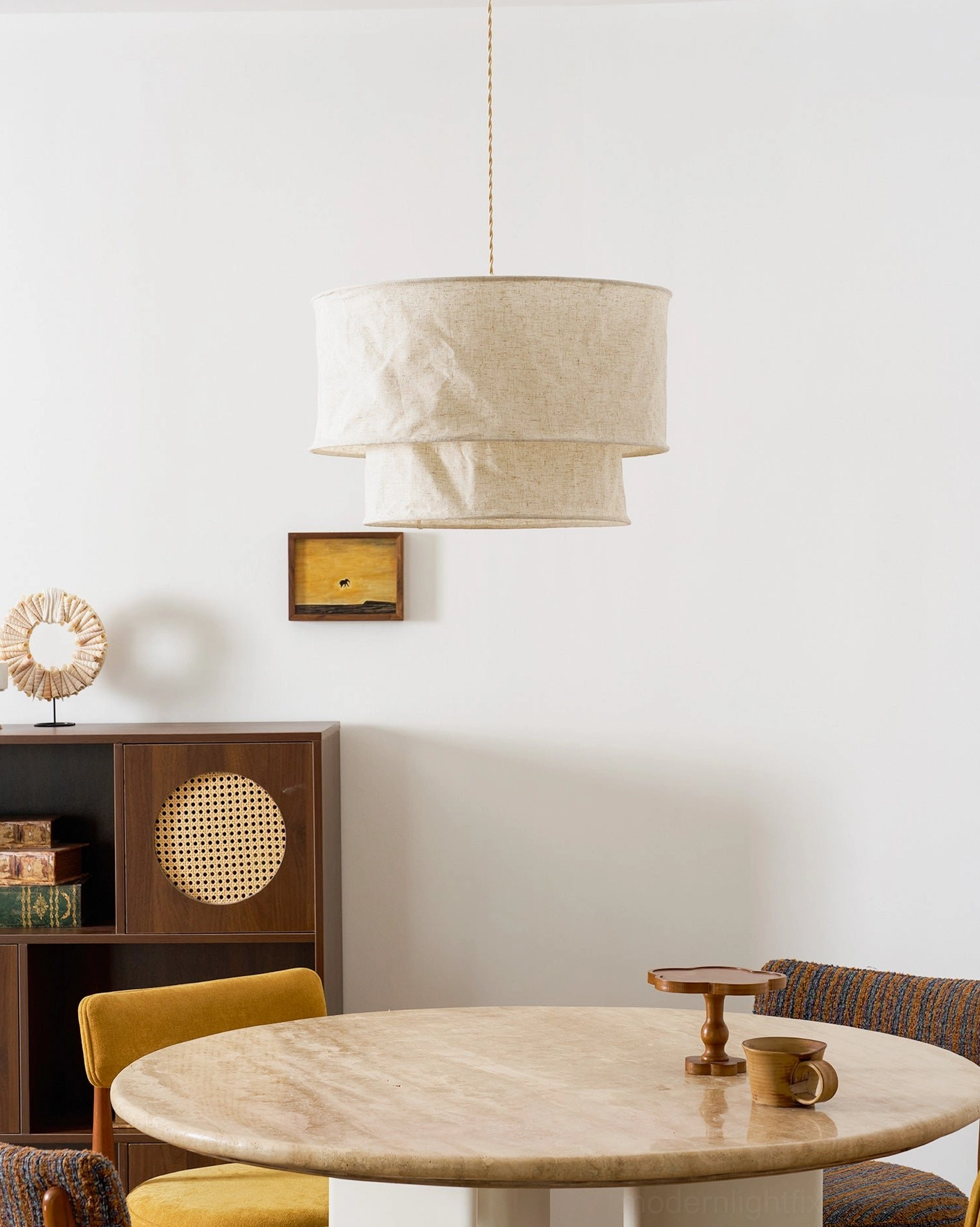 Double-layer crumpled linen pendant lamp creating warm ambient light in contemporary home design