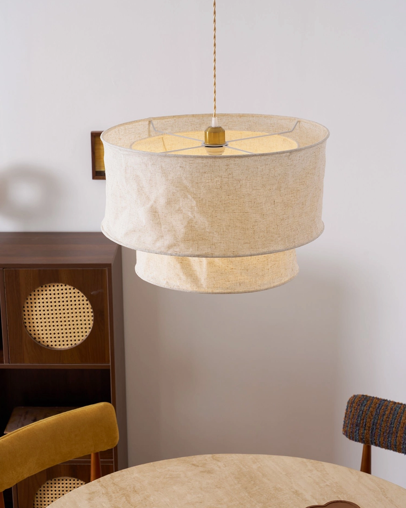 Mariela double-layer linen pendant light fixture in neutral interior with warm ambient glow