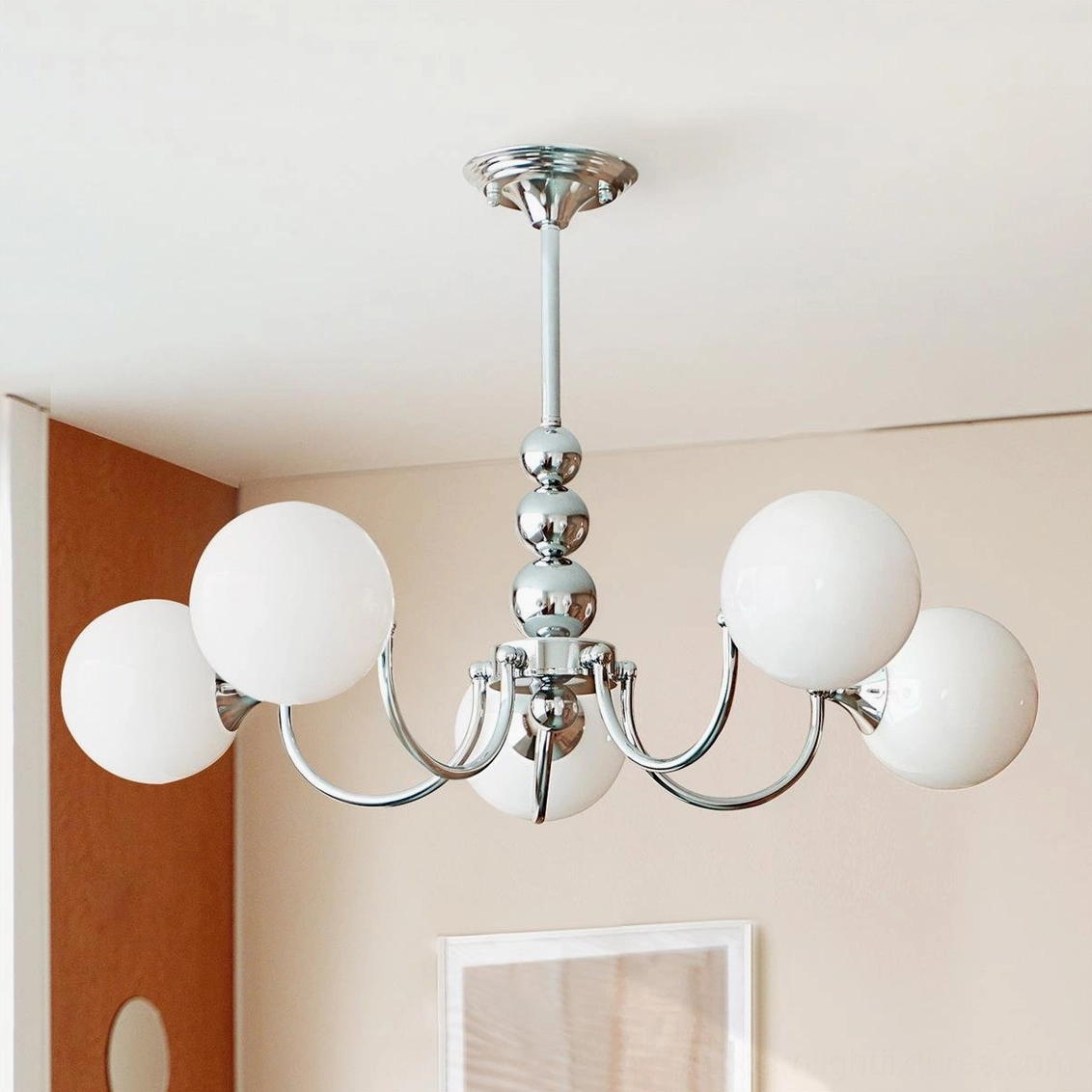 Marielle chandelier with curved chrome arms and luminous globe shades, architectural lighting detail
