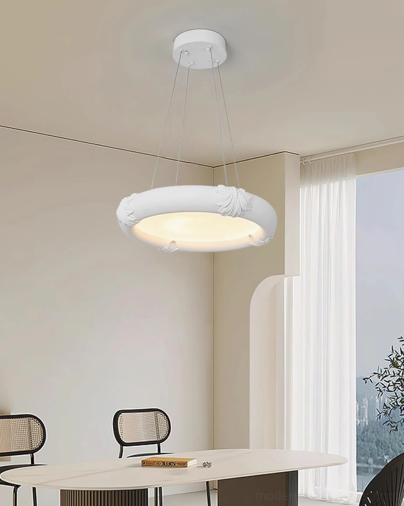 White plaster shell relief pendant light in modern minimalist dining room interior design