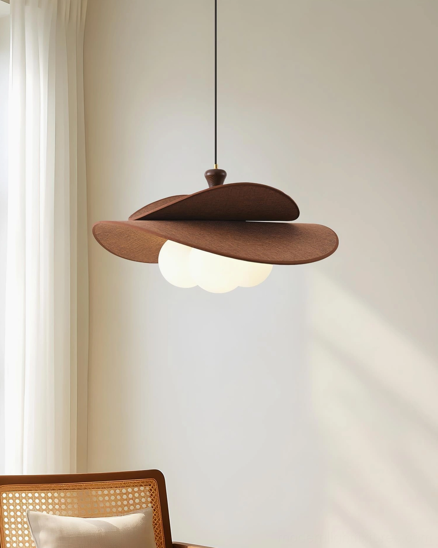 Marilo layered pendant light hanging in Japanese corner space with single opal globe and warm minimalist aesthetic
