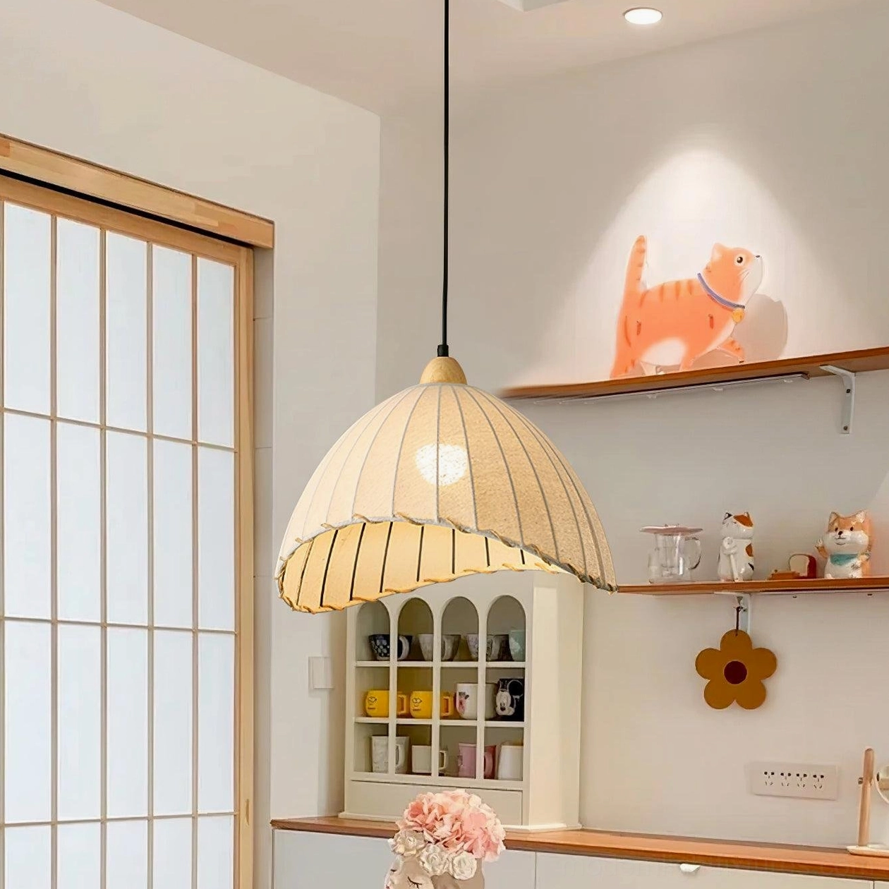 Maris pendant light with white pleated linen shade in Scandinavian minimalist interior design