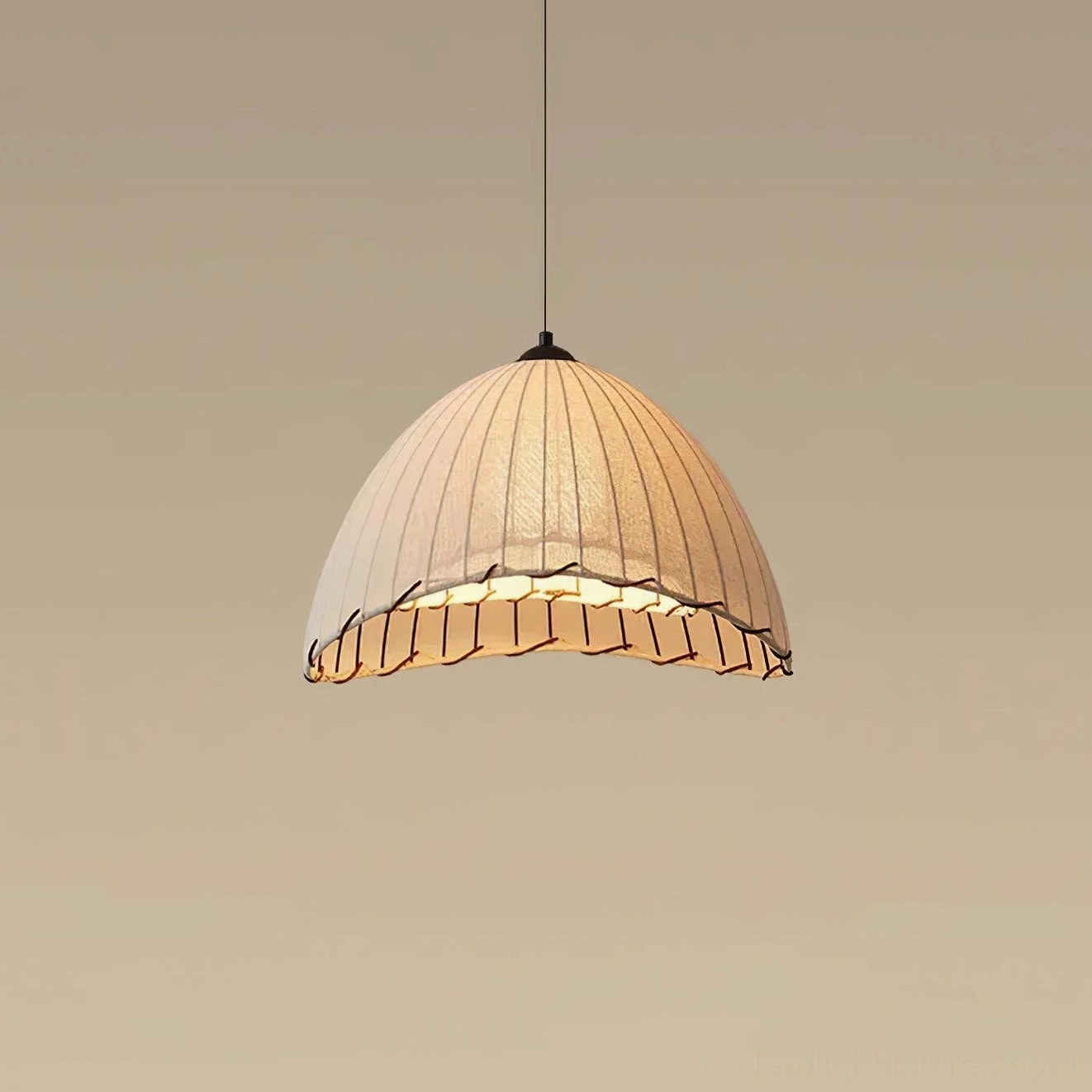 Front low-angle display of Maris pleated linen pendant lamp with scalloped edge detail