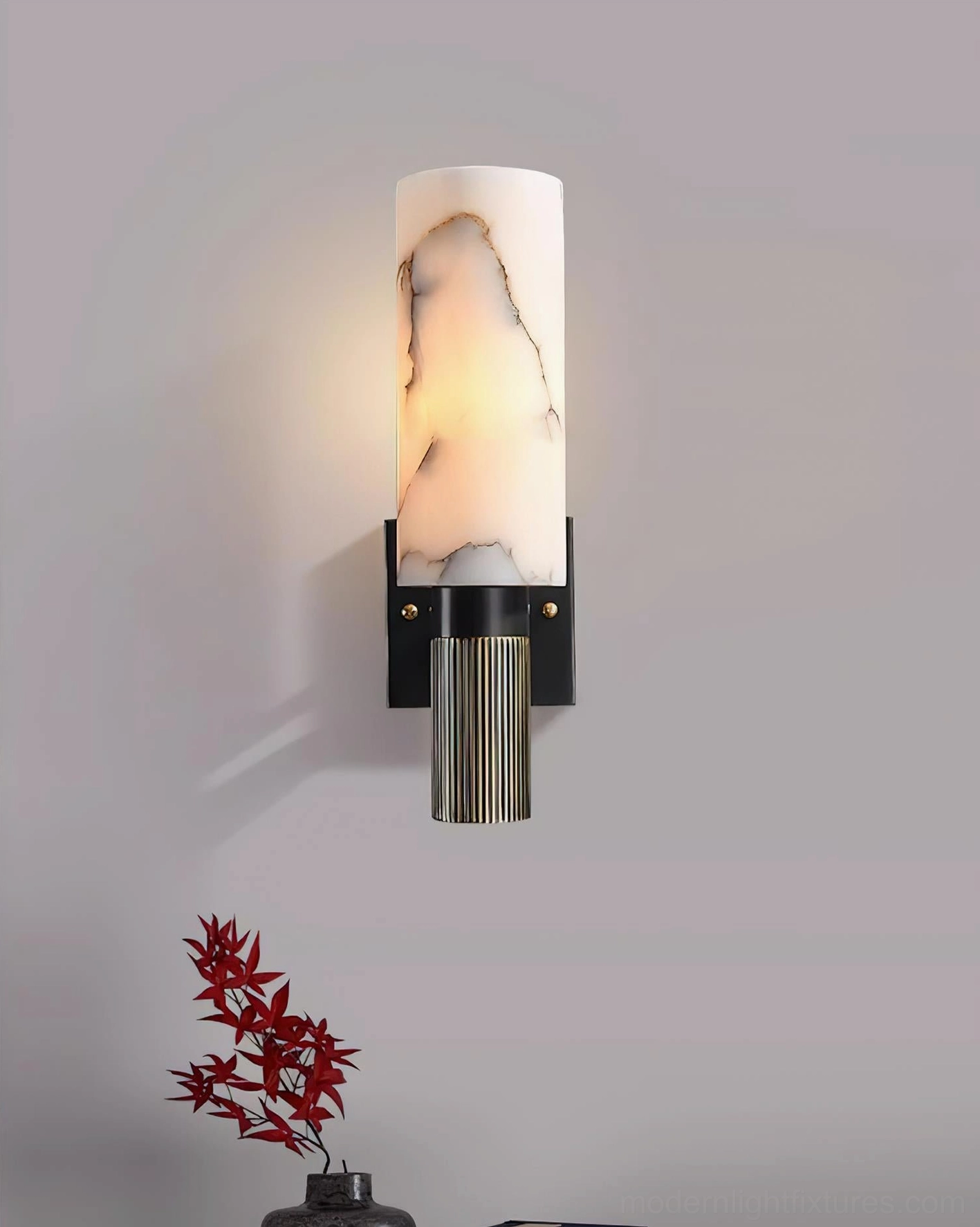 Bedside wall lamp providing warm light accent in bedroom interior design